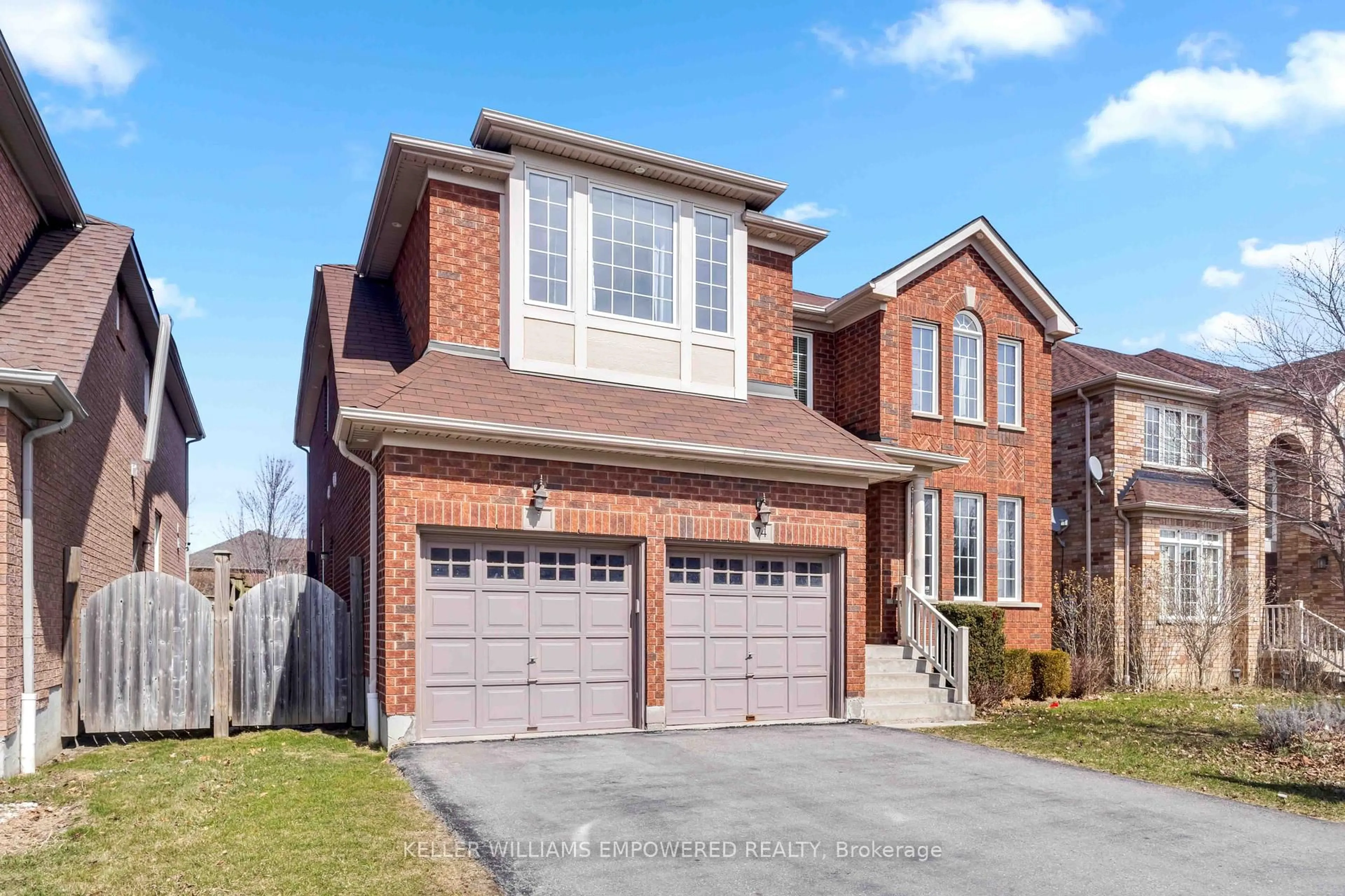 Home with brick exterior material, street for 74 Twin Streams Rd, Whitby Ontario L1P 0A4