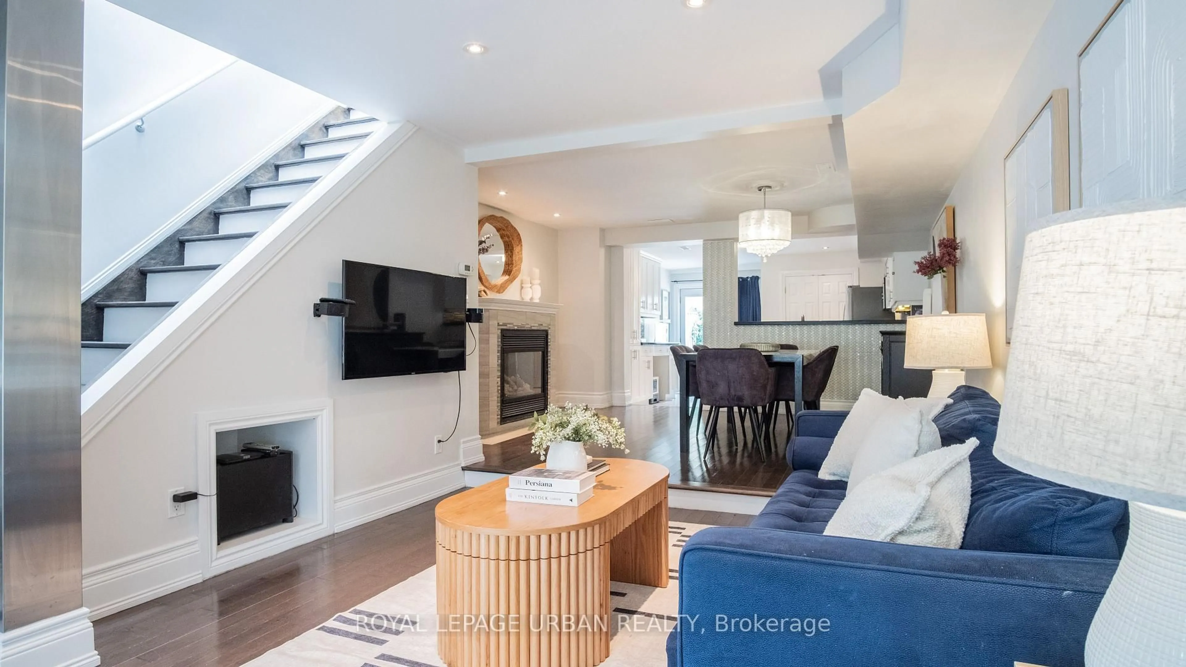 Living room with furniture, wood/laminate floor for 54 Arundel Ave, Toronto Ontario M4K 3A4