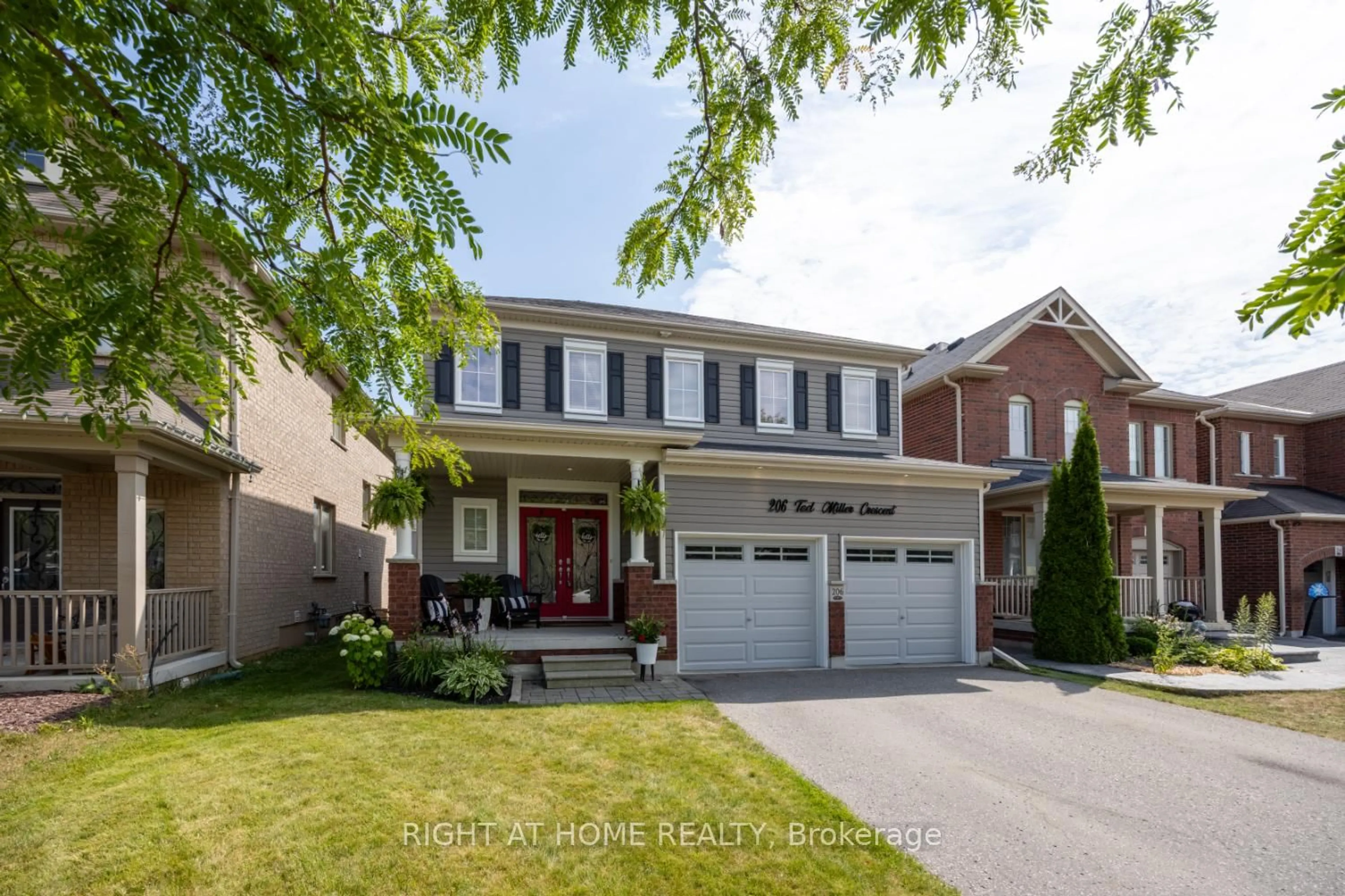 Home with brick exterior material, street for 206 Ted Miller Cres, Clarington Ontario L1C 0L6