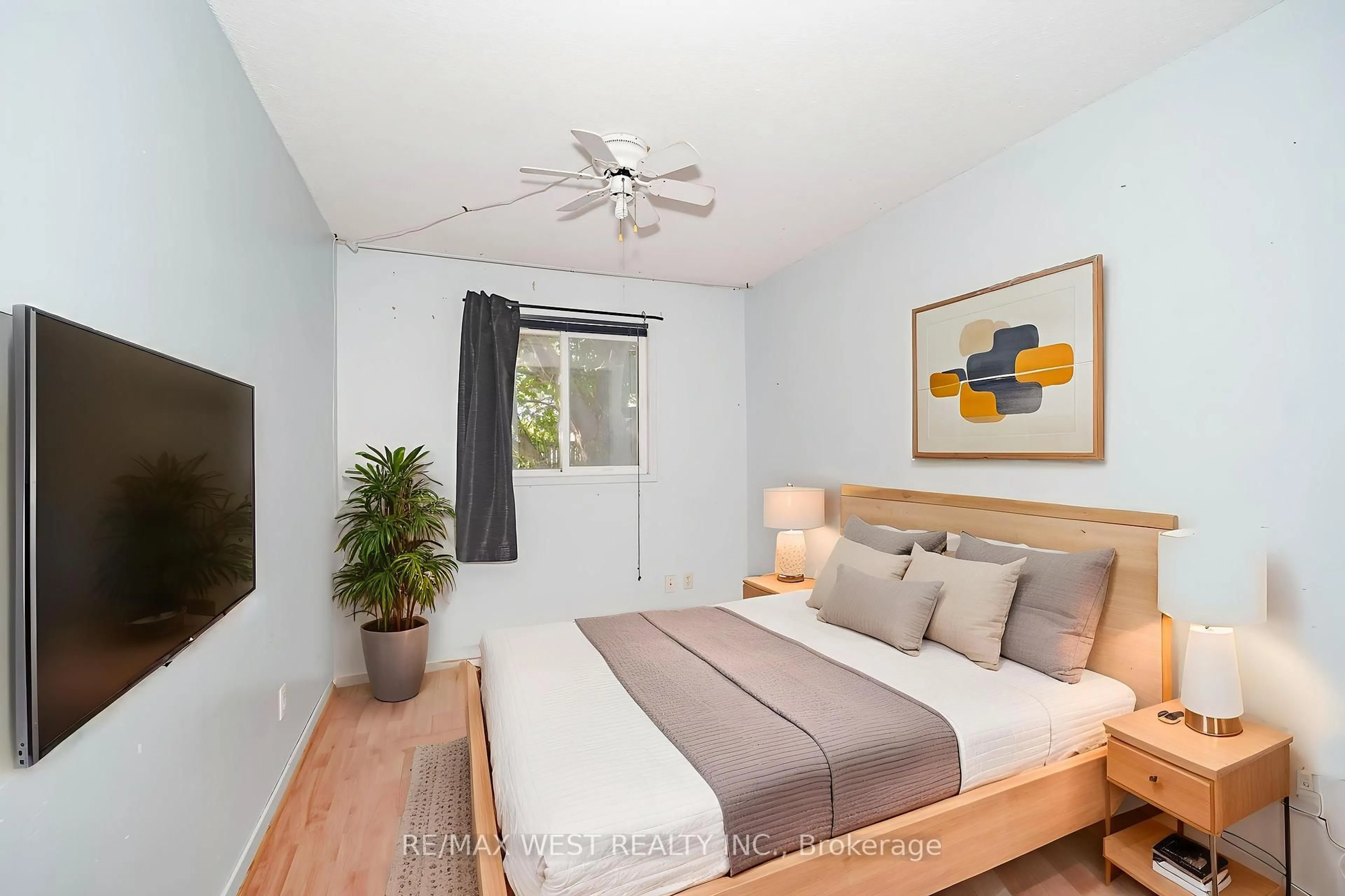 Bedroom with bed, wood/laminate floor for 18 Stanbridge Crt, Toronto Ontario M1B 2S5