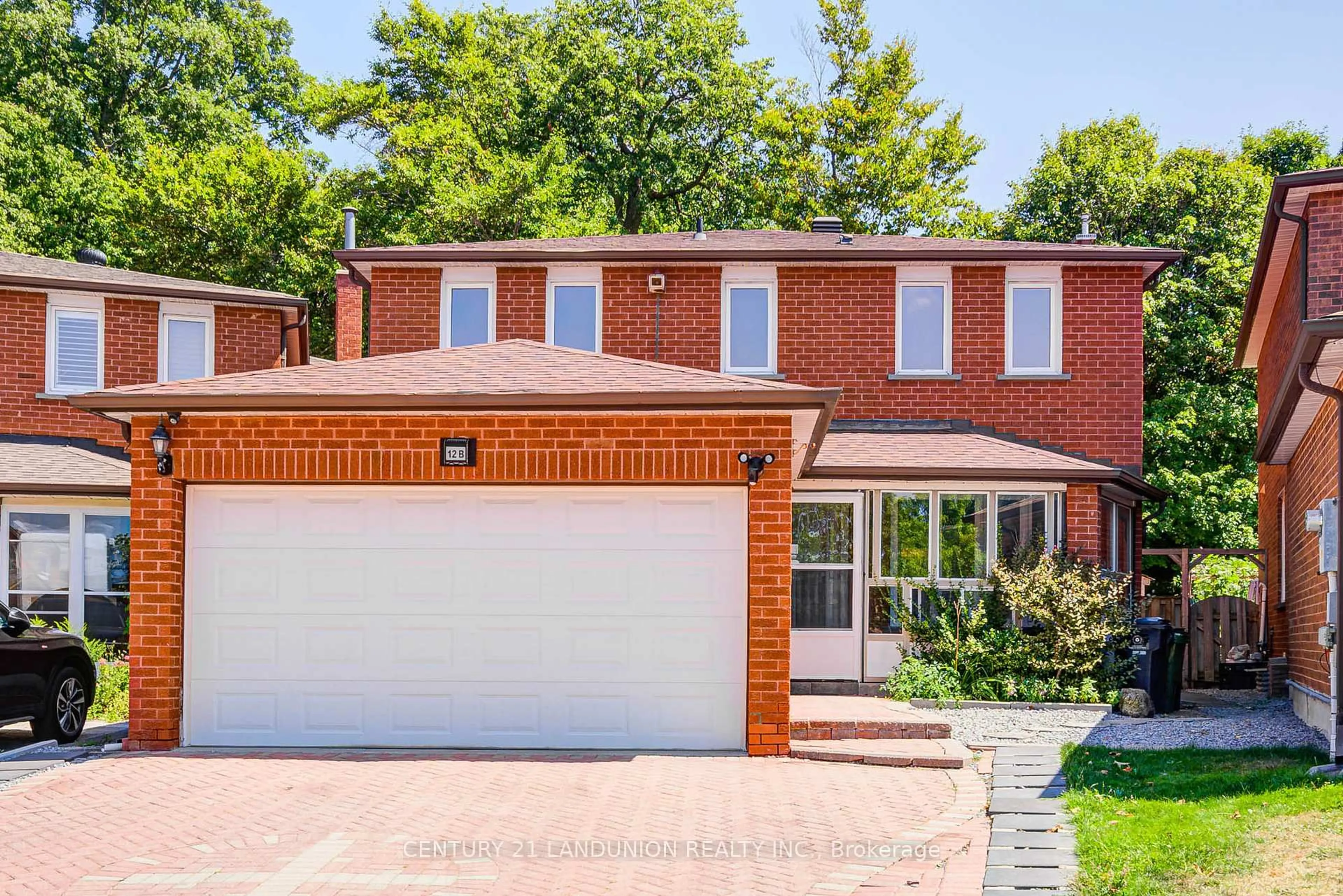 Home with brick exterior material, street for 12B Burnt Bark Dr, Toronto Ontario M1V 3J8