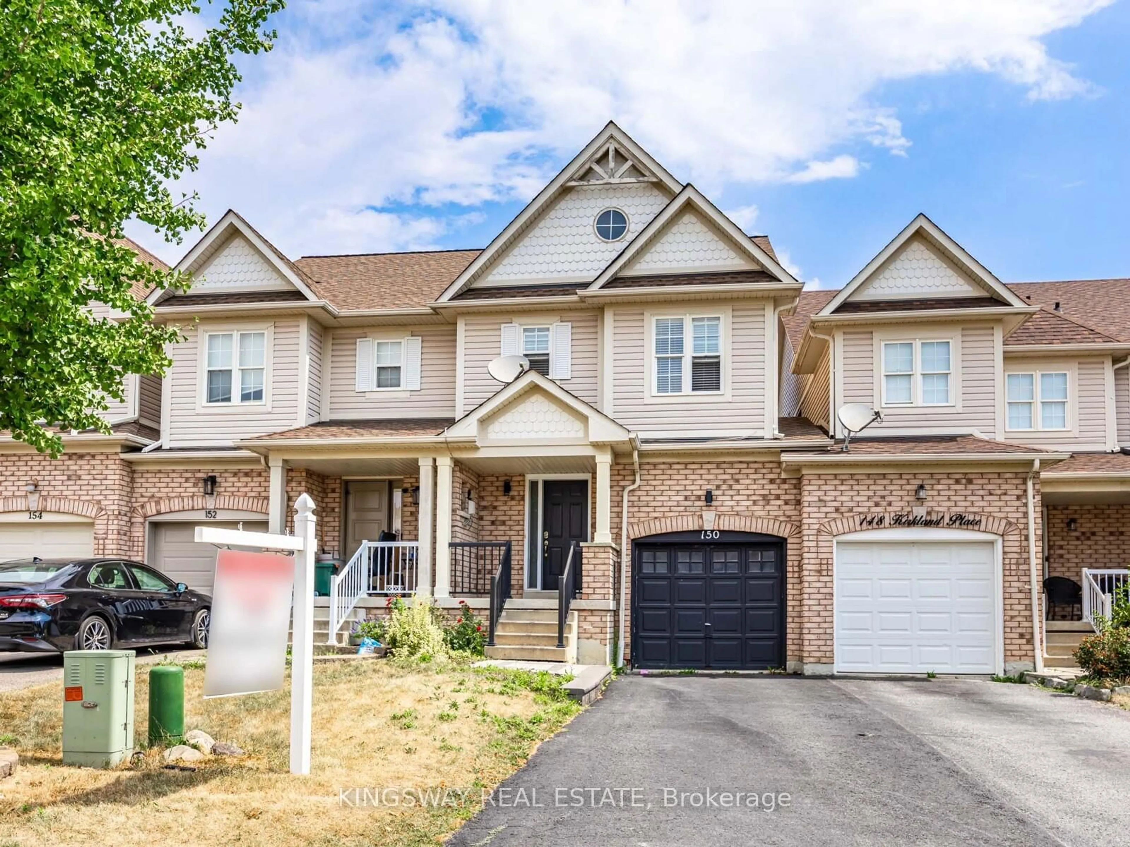 Home with brick exterior material, street for 150 Kirkland Pl, Whitby Ontario L1P 1X2