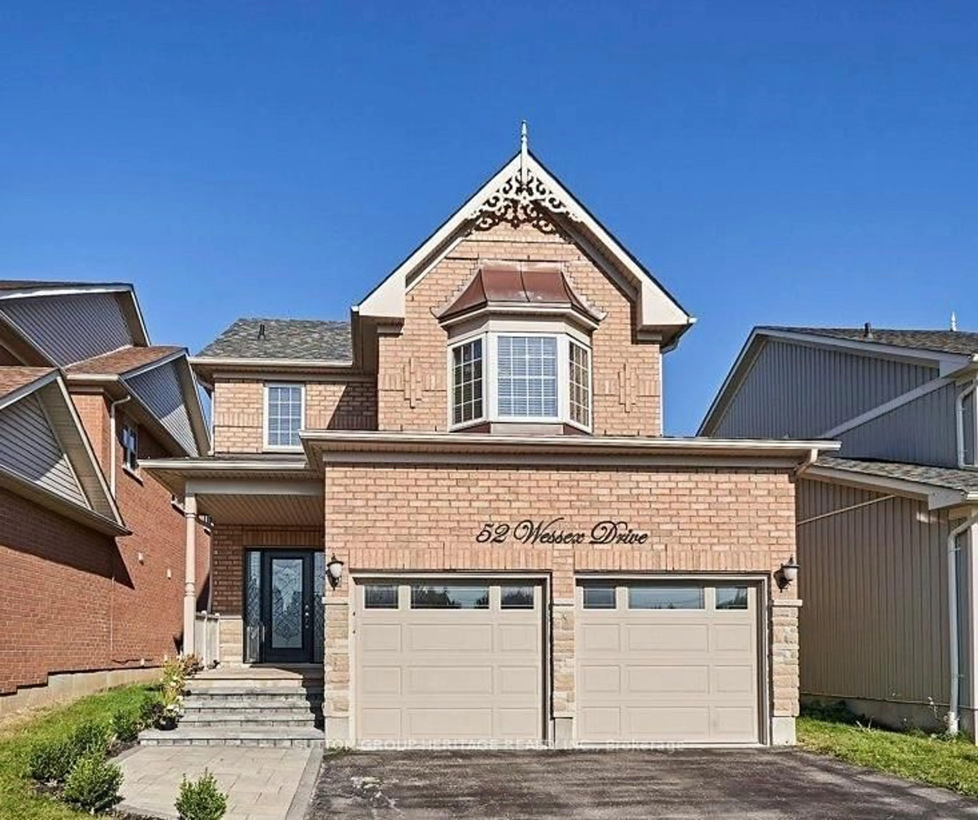 Home with brick exterior material, street for 52 Wessex Dr, Whitby Ontario L1M 2C3