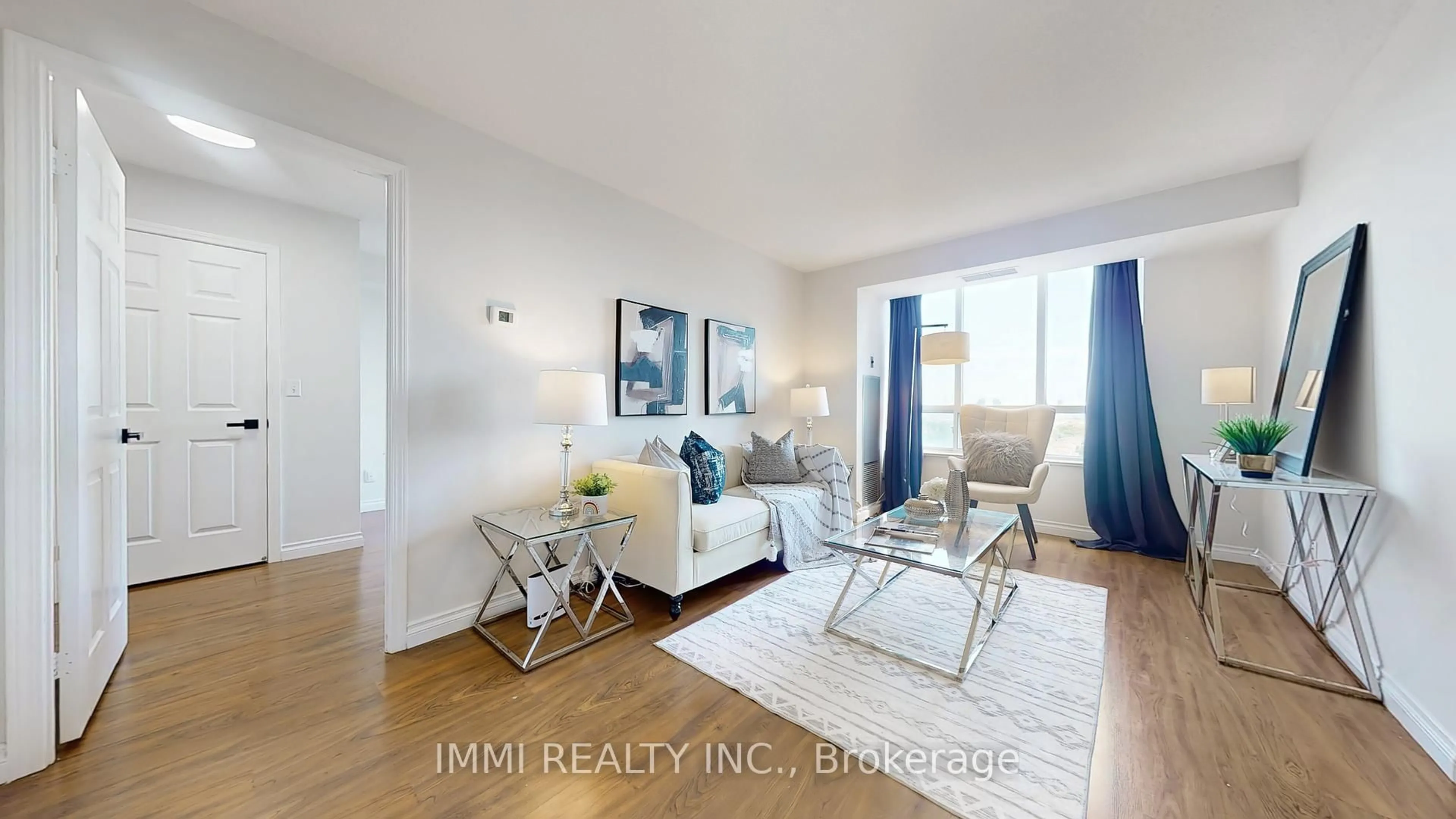 Living room with furniture, wood/laminate floor for 5039 Finch Ave #2009, Toronto Ontario M1S 5L6
