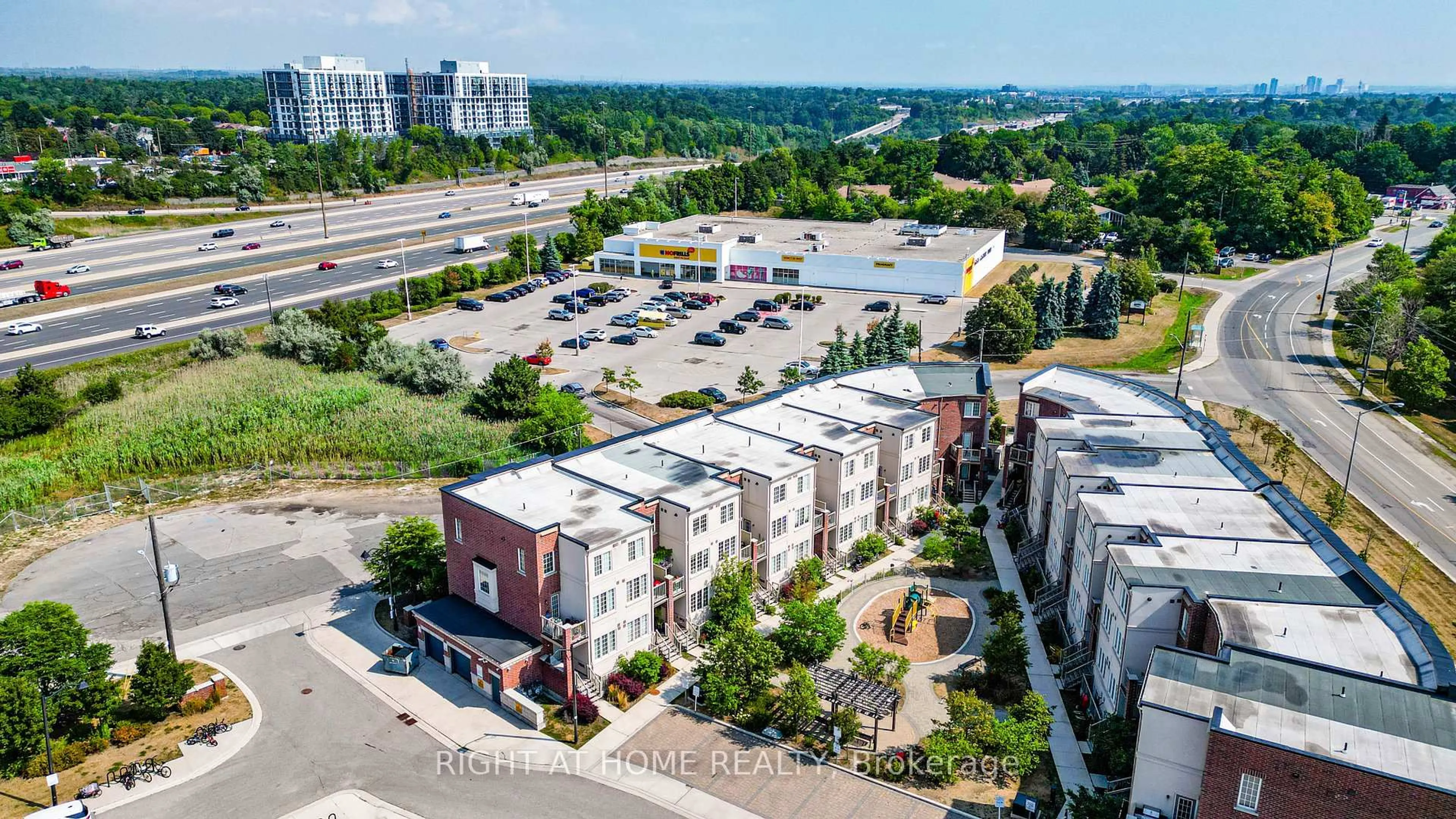 A pic from outside/outdoor area/front of a property/back of a property/a pic from drone, city buildings view from balcony for 33 Island Rd #6, Toronto Ontario M1C 2P5