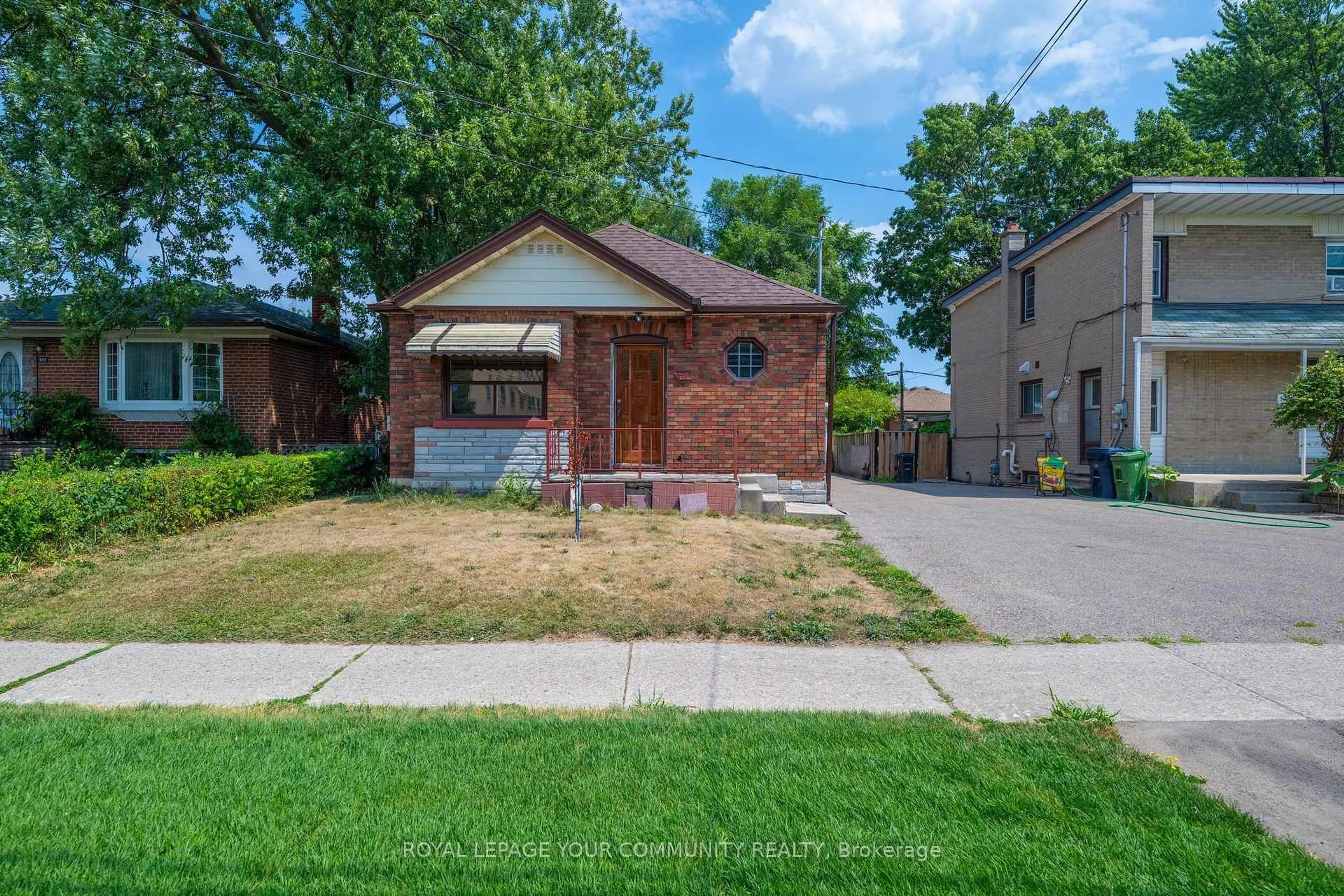Home with brick exterior material, street for 531 Birchmount Rd, Toronto Ontario M1K 1P1