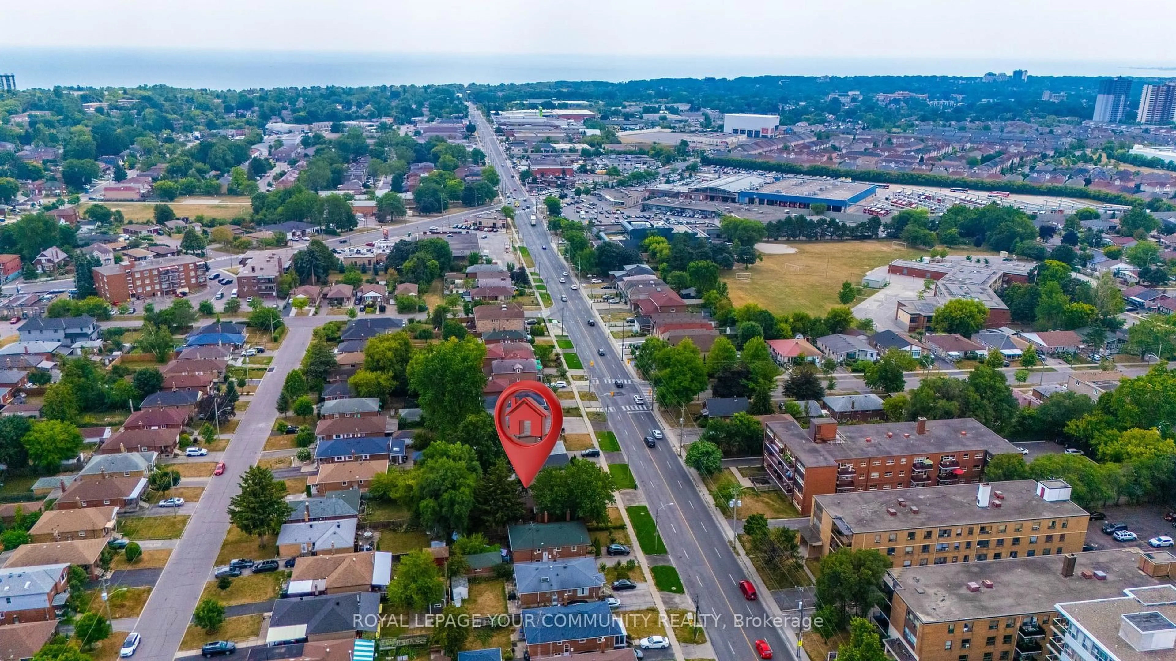 A pic from outside/outdoor area/front of a property/back of a property/a pic from drone, street for 531 Birchmount Rd, Toronto Ontario M1K 1P1