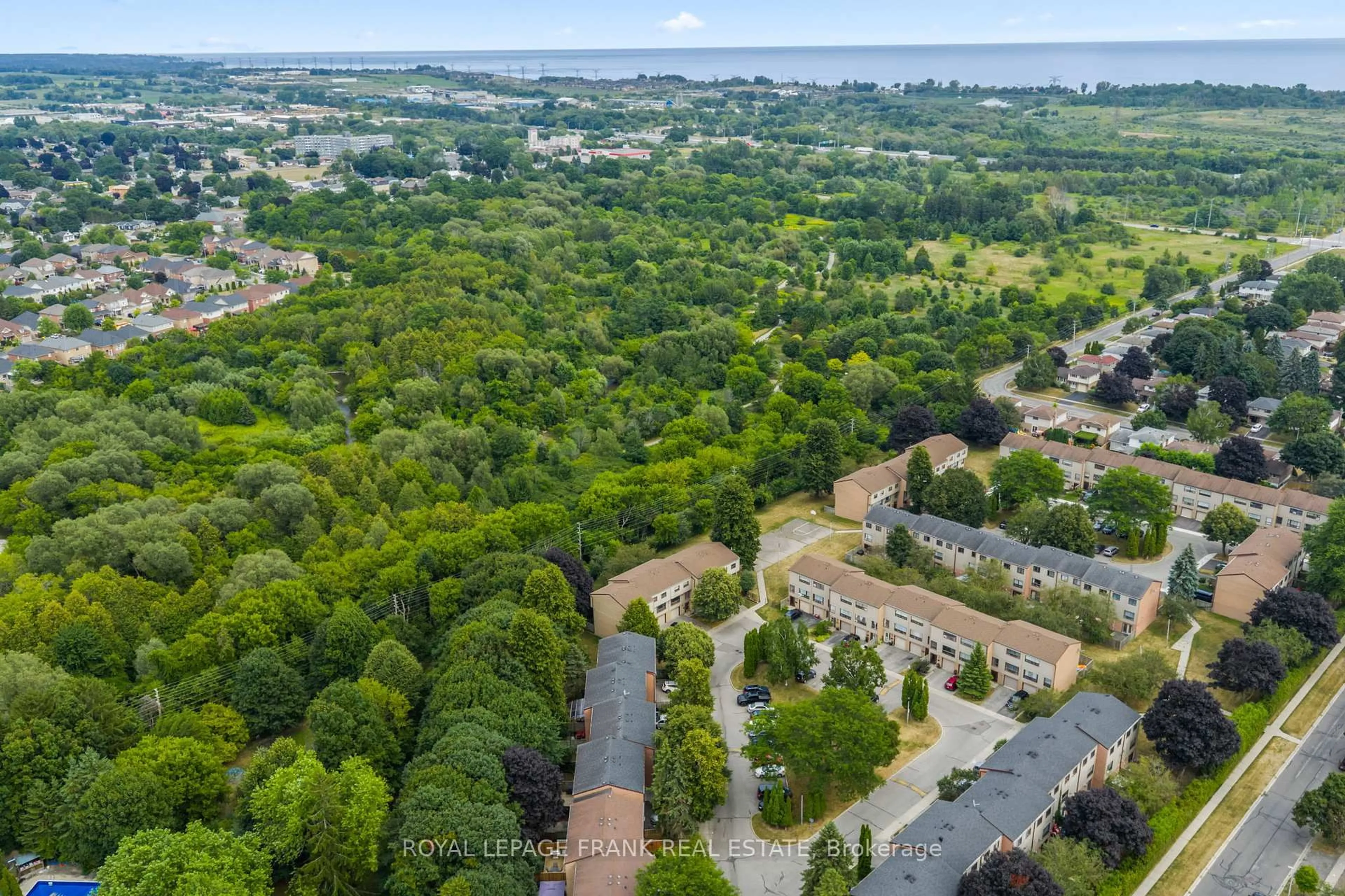 A pic from outside/outdoor area/front of a property/back of a property/a pic from drone, forest/trees view for 9 The Bridle Path, Clarington Ontario L1C 3W1