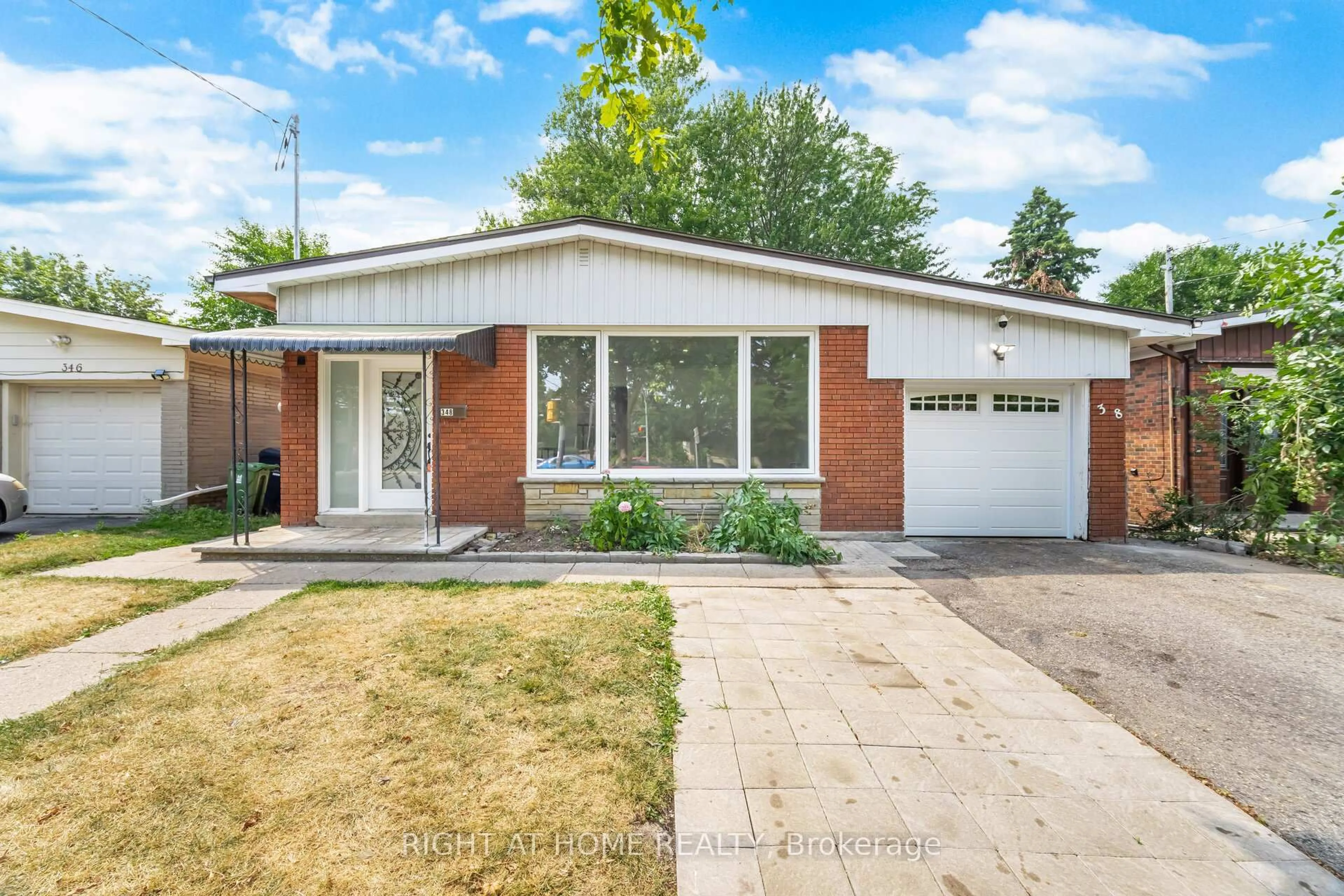 Home with brick exterior material, street for 348 Bellamy Rd, Toronto Ontario M1H 1E8