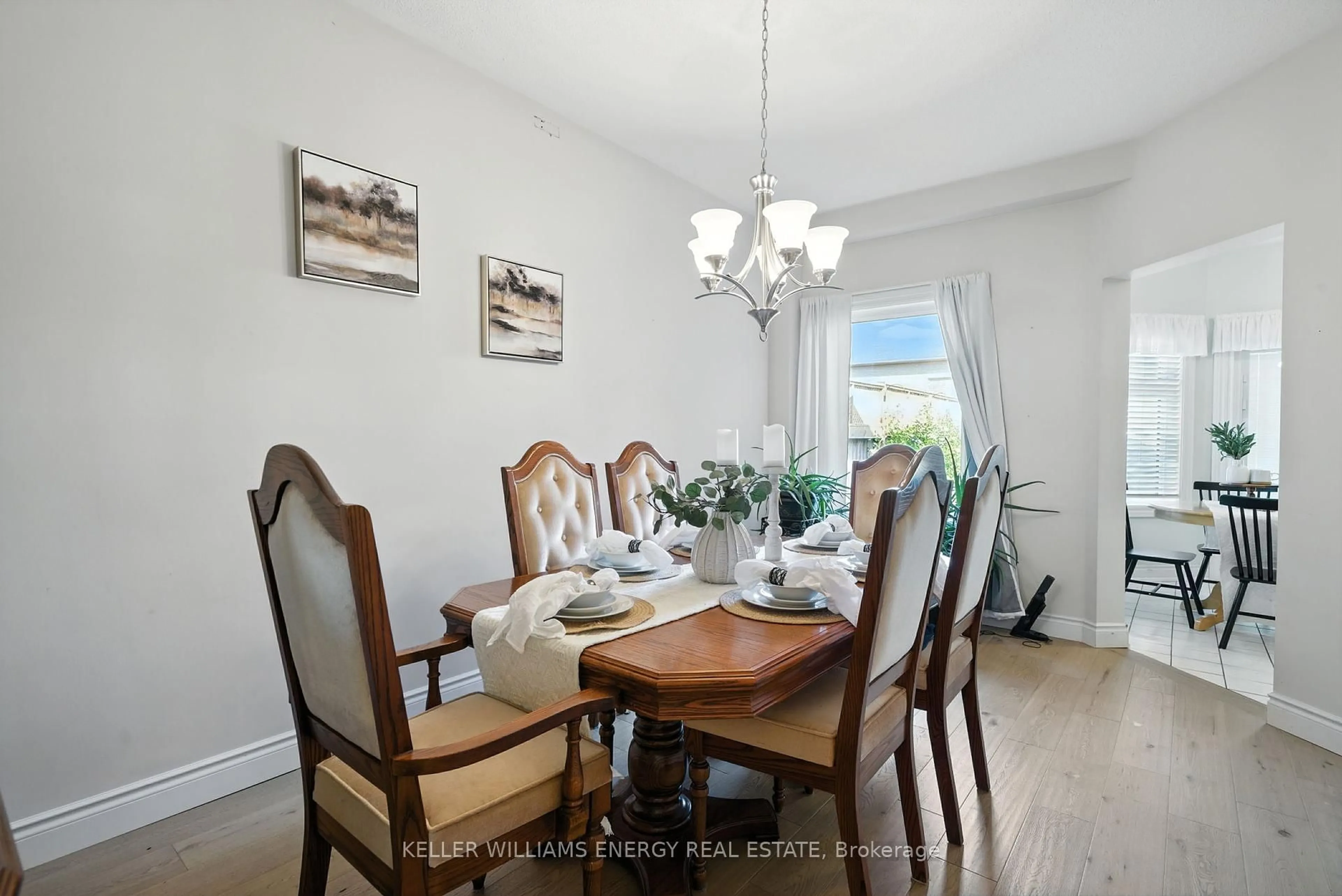 Dining room, wood/laminate floor for 14 Bach Ave, Whitby Ontario L1R 2M1