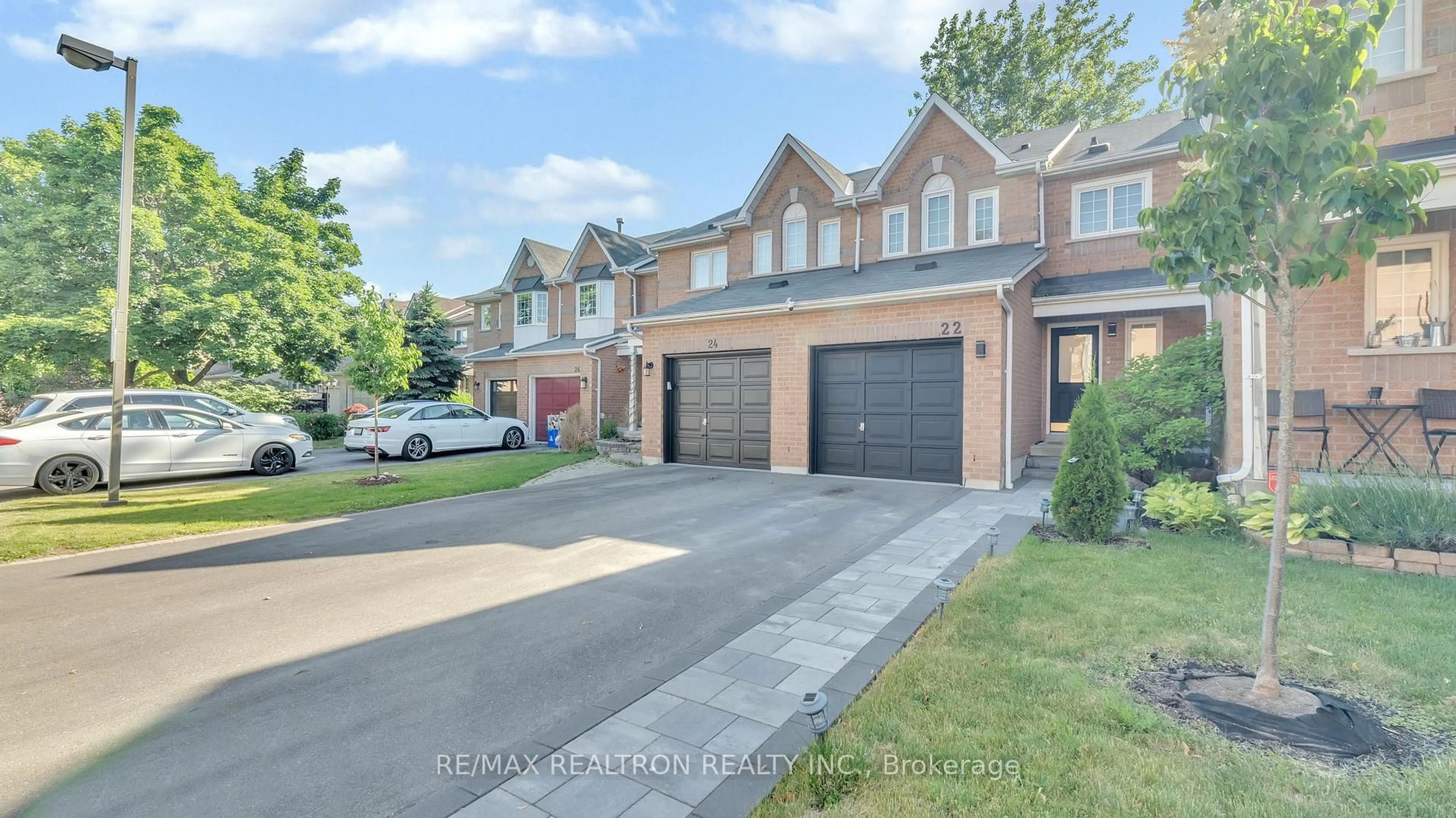 Home with brick exterior material, street for 22 Macintyre Lane, Ajax Ontario L1T 3X3