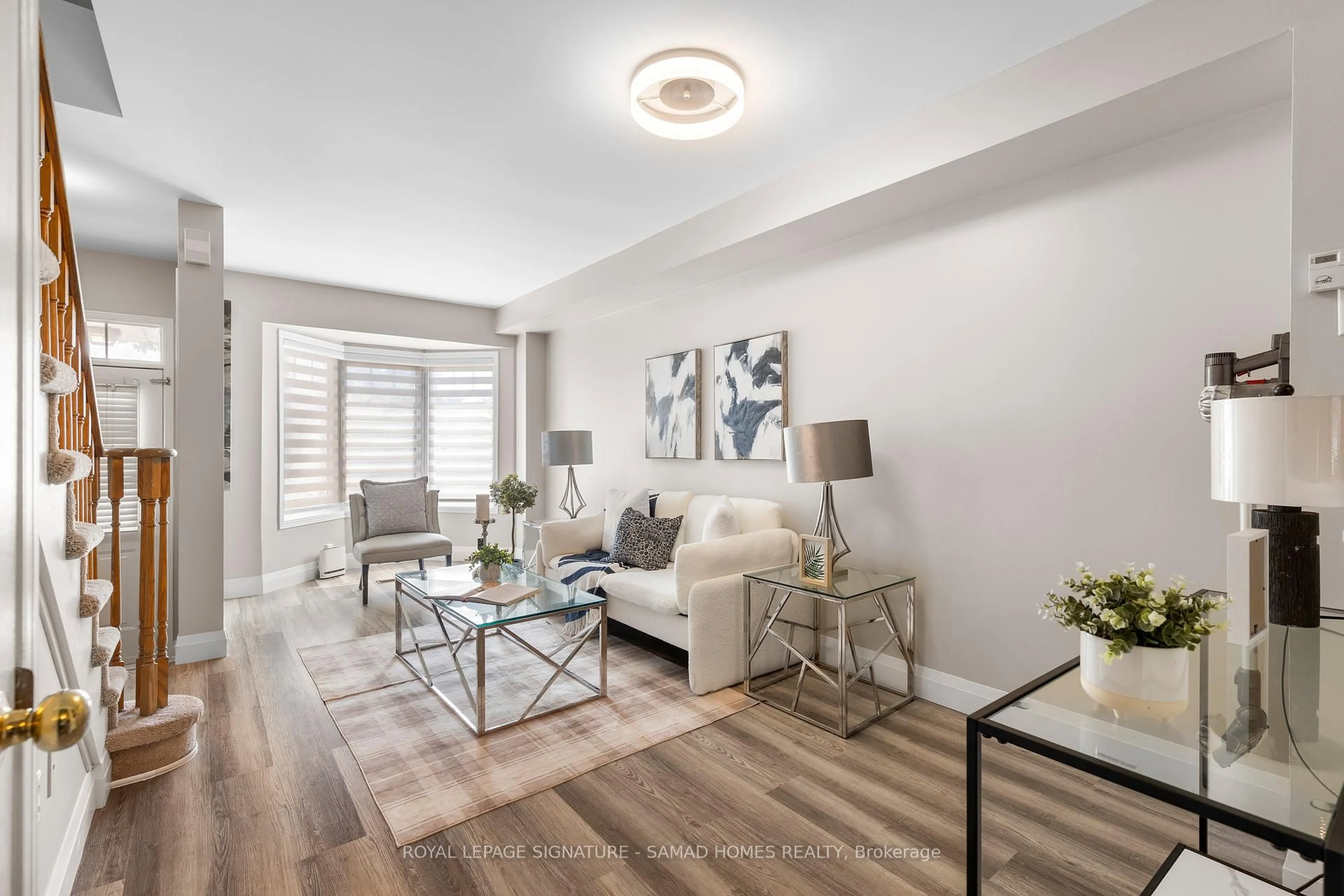 Living room with furniture, unknown for 9522 Sheppard Ave, Toronto Ontario M1B 5Z4