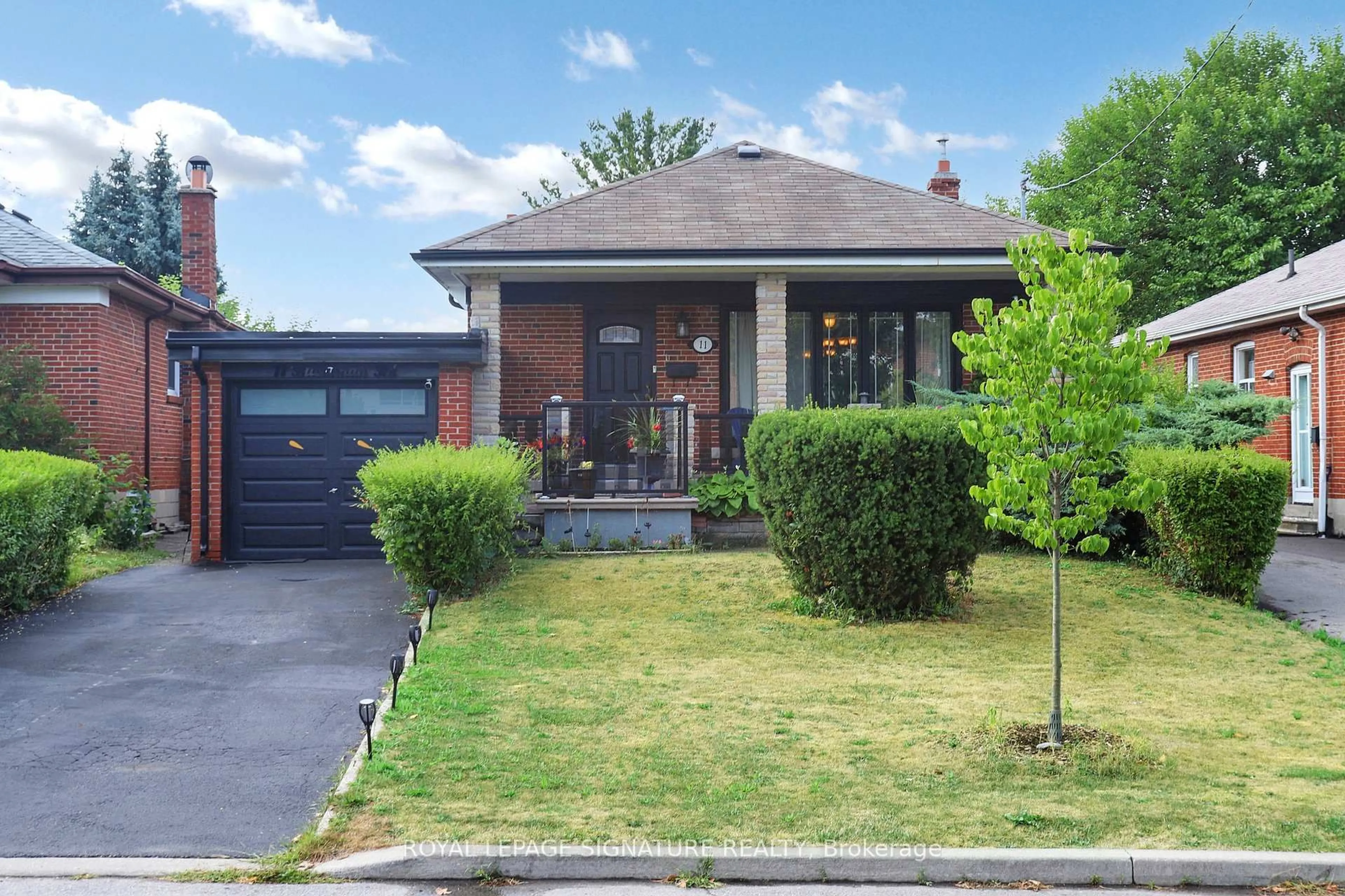 Home with brick exterior material, street for 11 Bucannan Rd, Toronto Ontario M1R 3V2