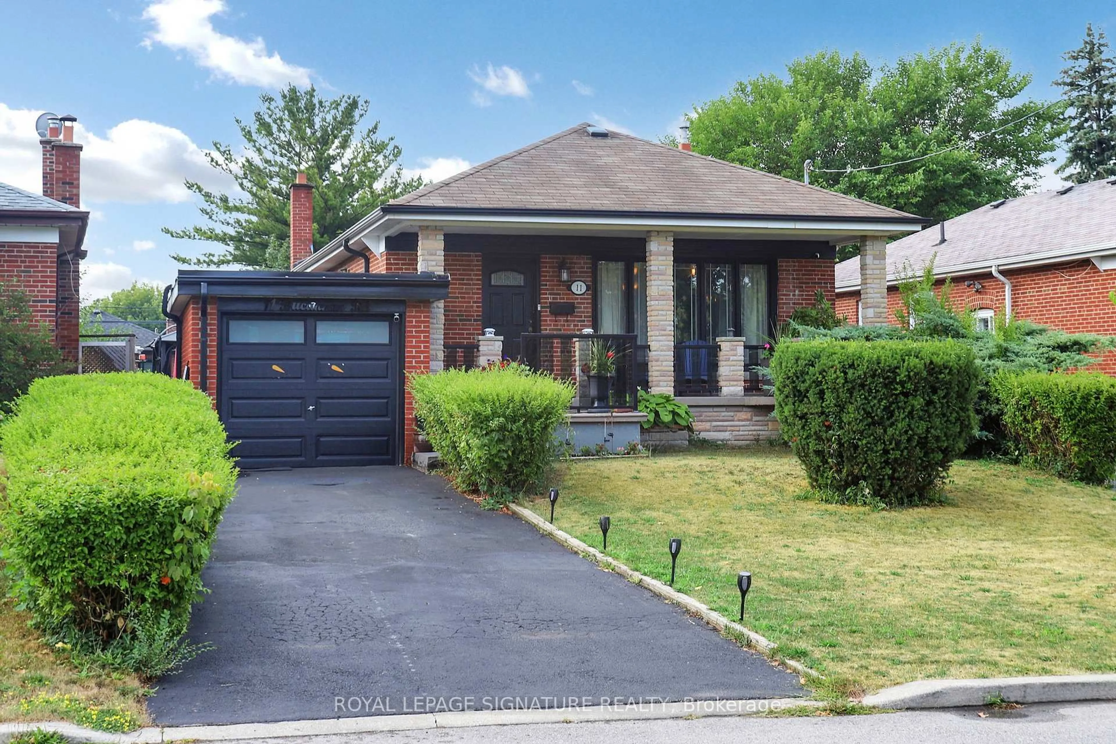 Home with brick exterior material, street for 11 Bucannan Rd, Toronto Ontario M1R 3V2