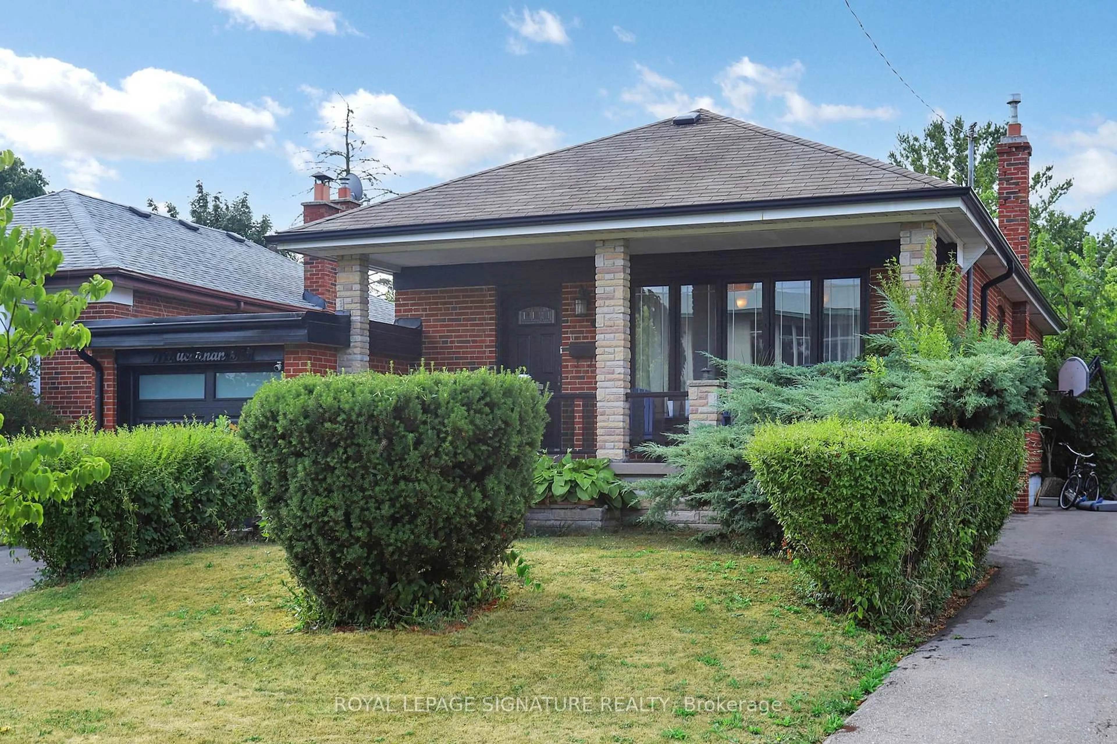 Home with brick exterior material, street for 11 Bucannan Rd, Toronto Ontario M1R 3V2
