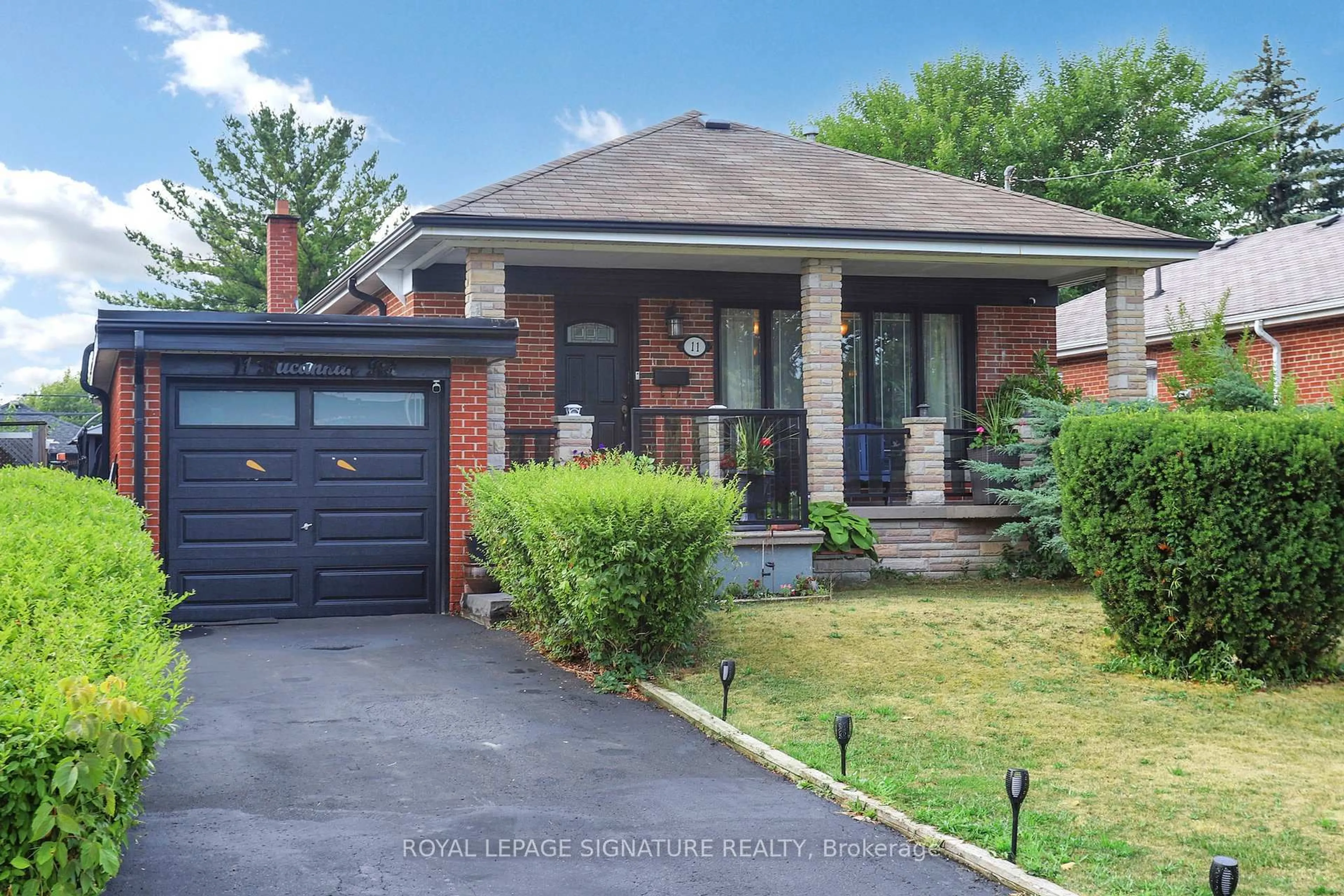 Home with brick exterior material, street for 11 Bucannan Rd, Toronto Ontario M1R 3V2