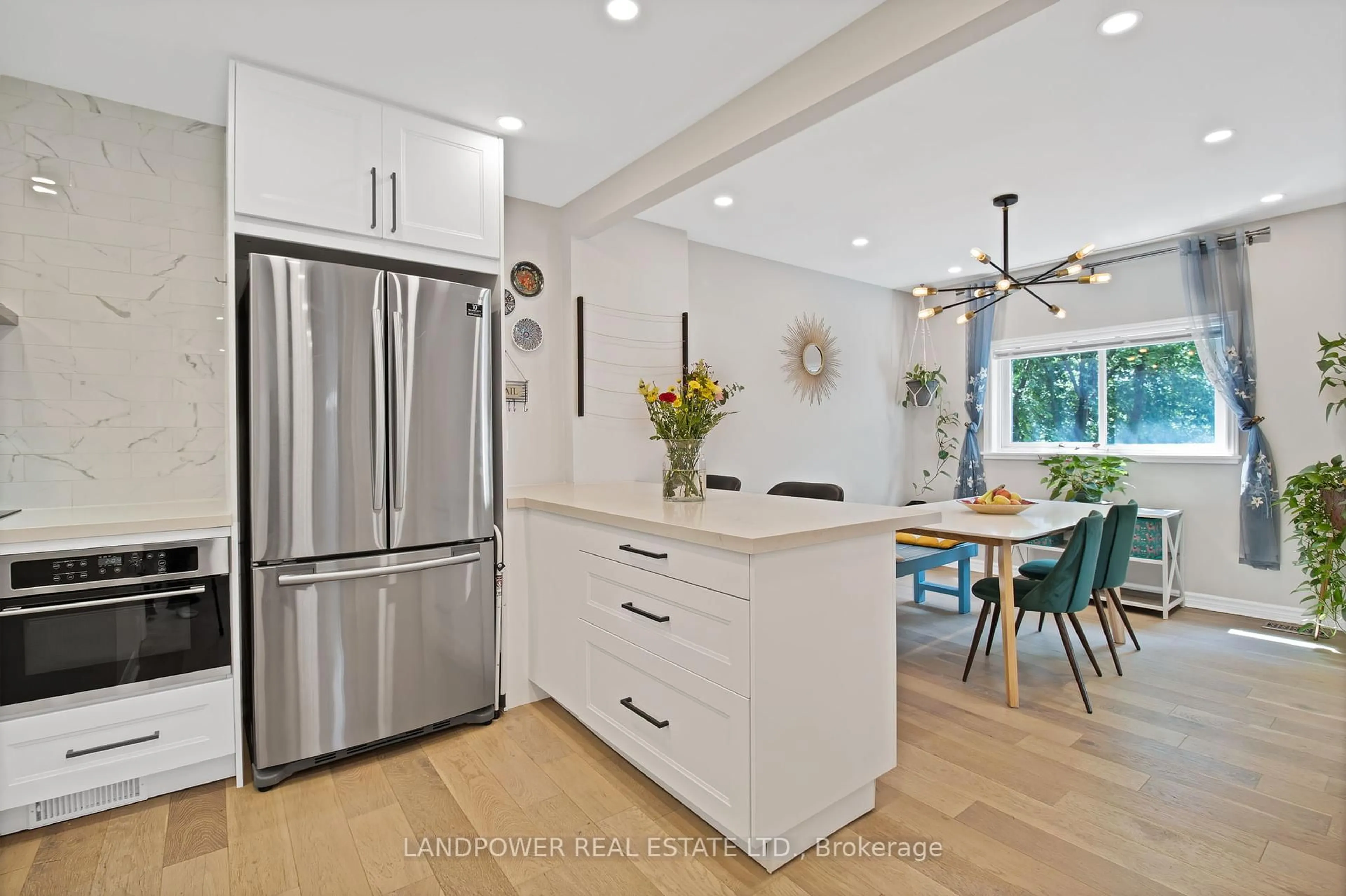 Open concept kitchen, unknown for 3133 St. Clair Ave, Toronto Ontario M1L 1V2