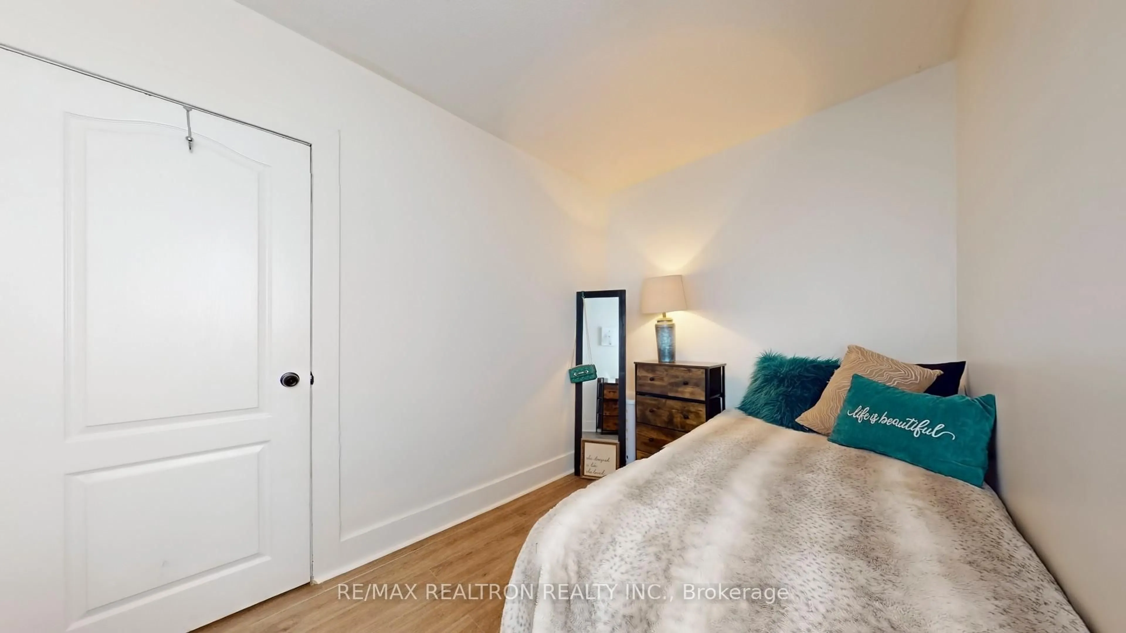 Bedroom with bed, wood/laminate floor for 283 College Ave, Oshawa Ontario L1J 1R9