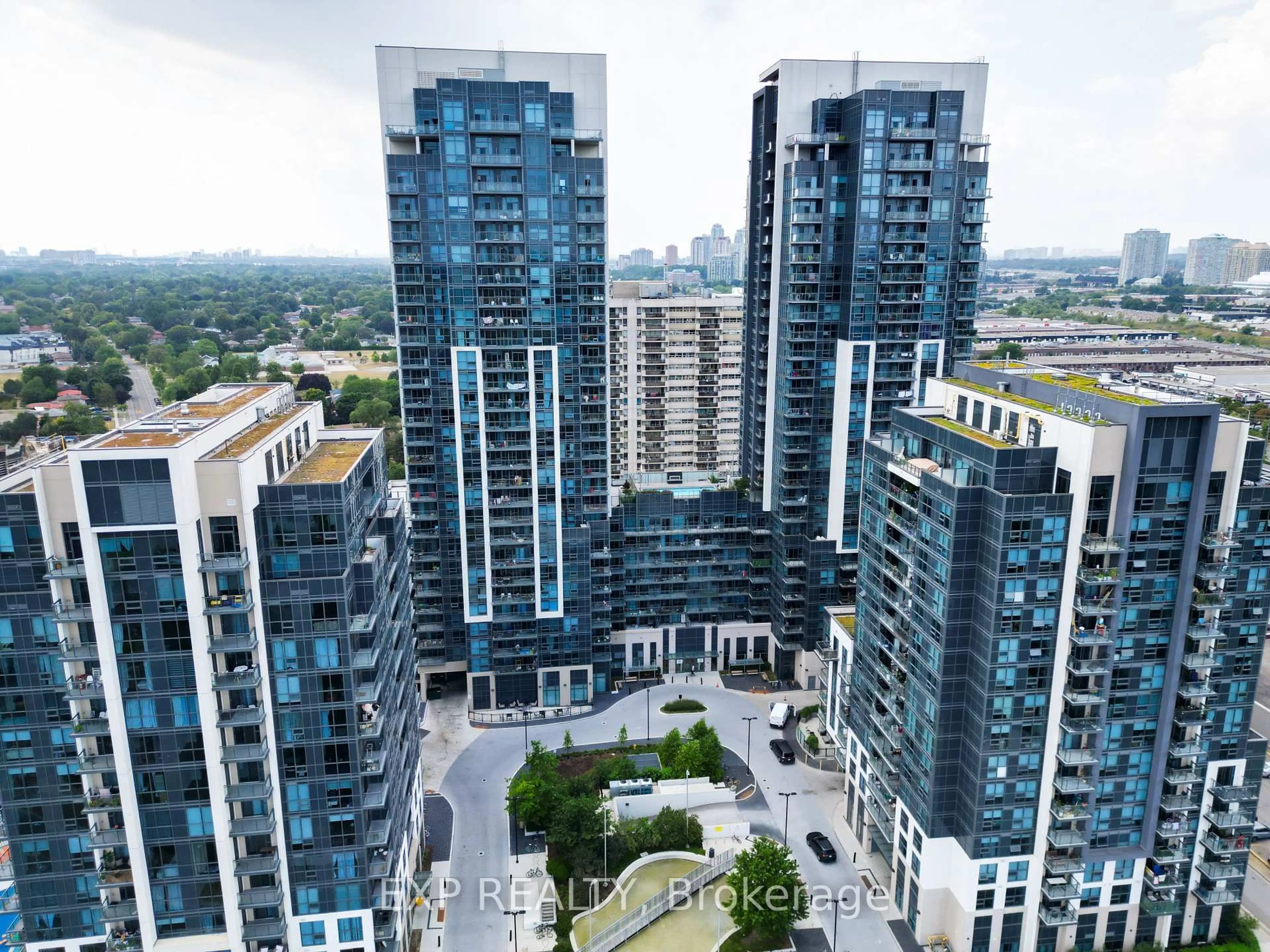 A pic from outside/outdoor area/front of a property/back of a property/a pic from drone, city buildings view from balcony for 30 Meadowglen Pl #707, Toronto Ontario M1G 0A6