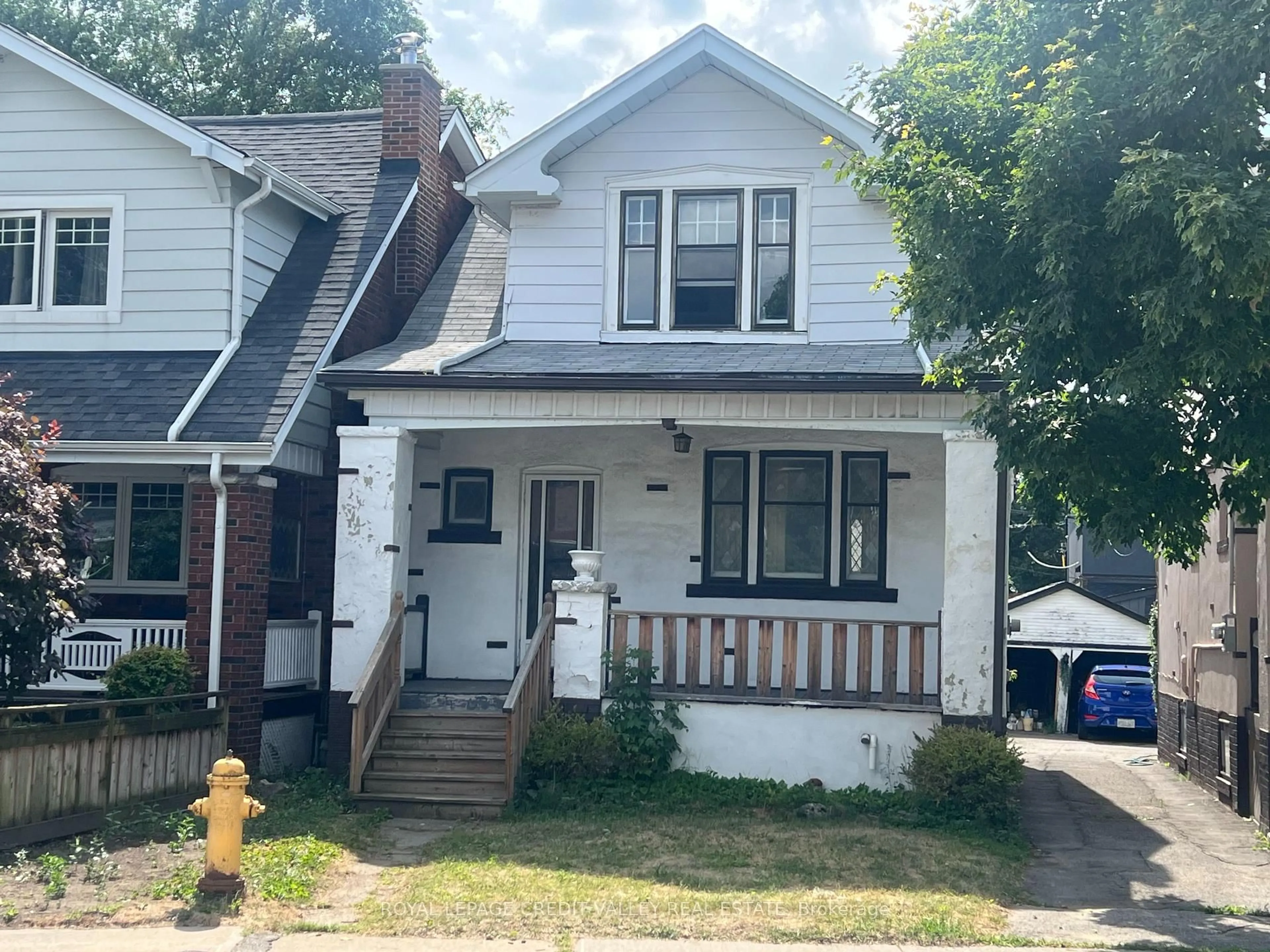 Home with vinyl exterior material, street for 12 Stanhope Ave, Toronto Ontario M4K 3N5