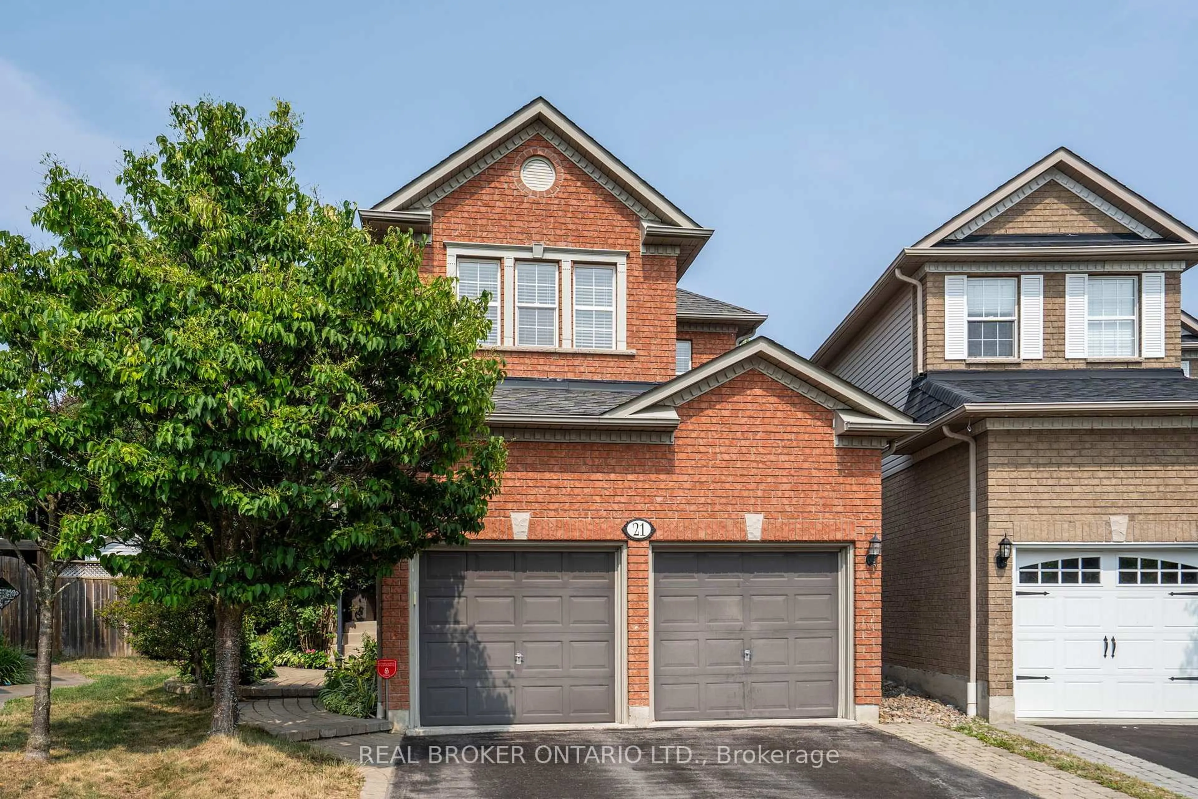 Home with brick exterior material, street for 21 Shenandoah Dr, Whitby Ontario L1P 1S9