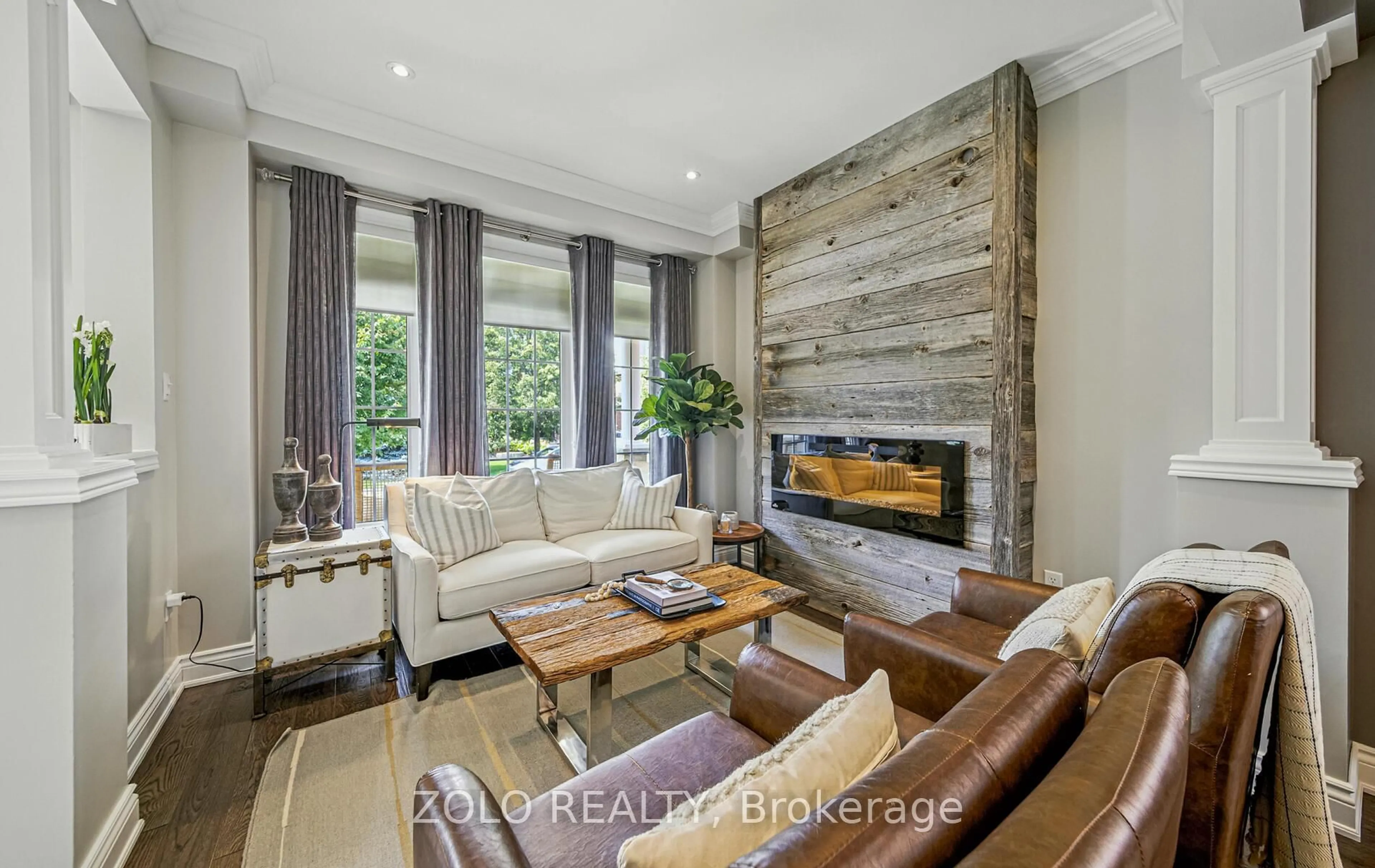 Living room with furniture, wood/laminate floor for 3 Covington Dr, Whitby Ontario L1M 2K4