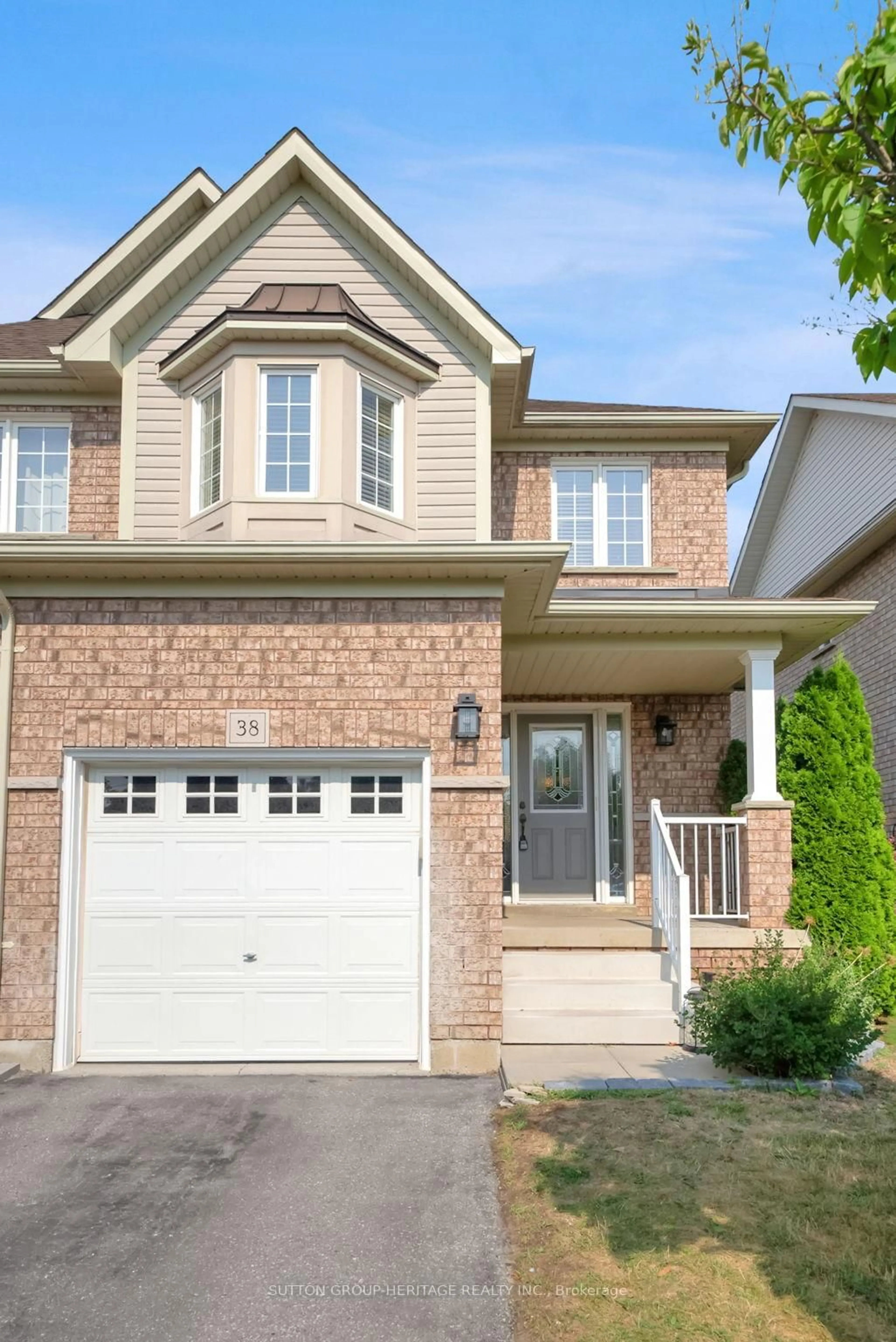 Home with brick exterior material, street for 460 Woodmount Dr #38, Oshawa Ontario L1K 0K3