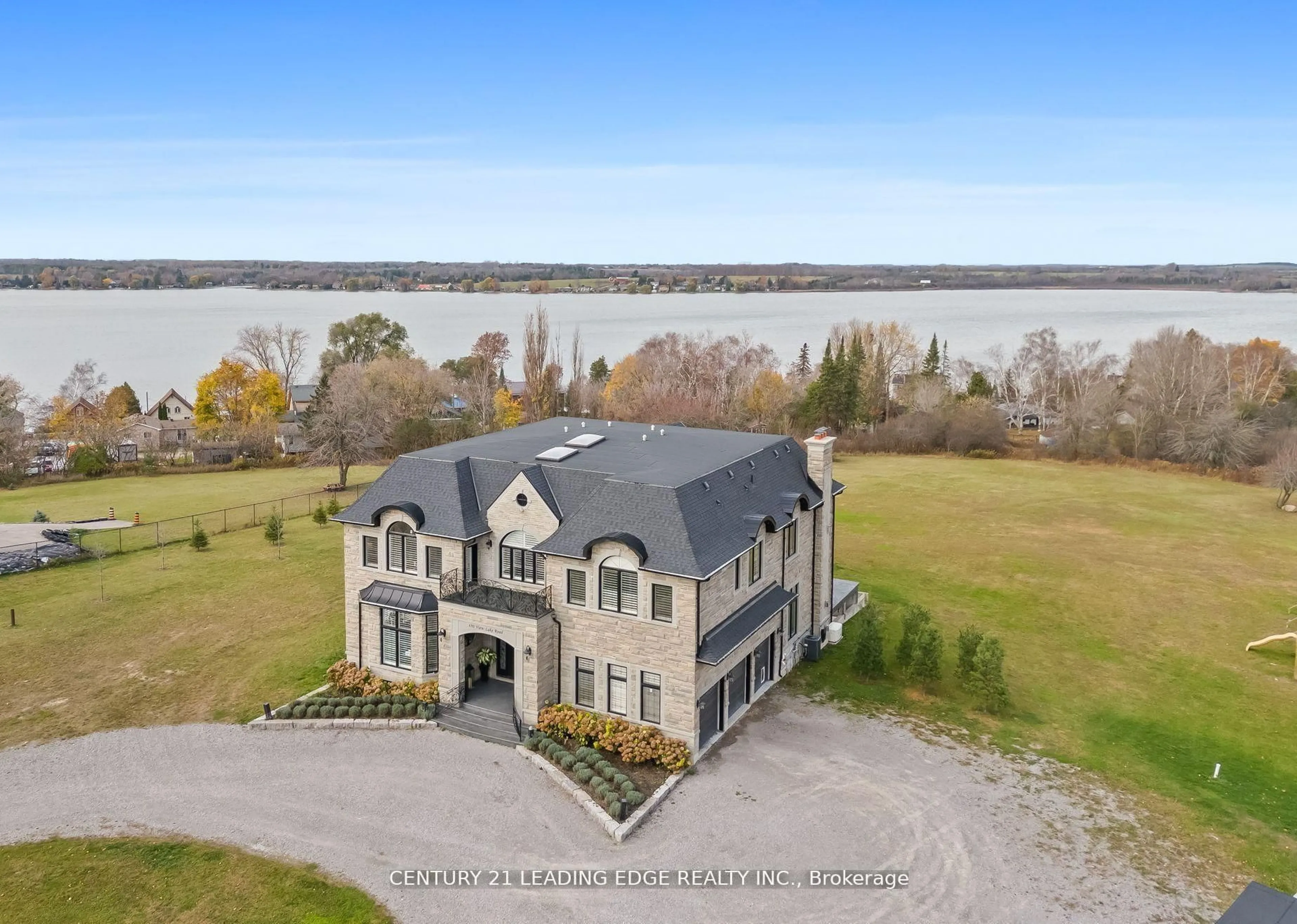 A pic from outside/outdoor area/front of a property/back of a property/a pic from drone, water/lake/river/ocean view for 690 View Lake Rd, Scugog Ontario L0B 1K0