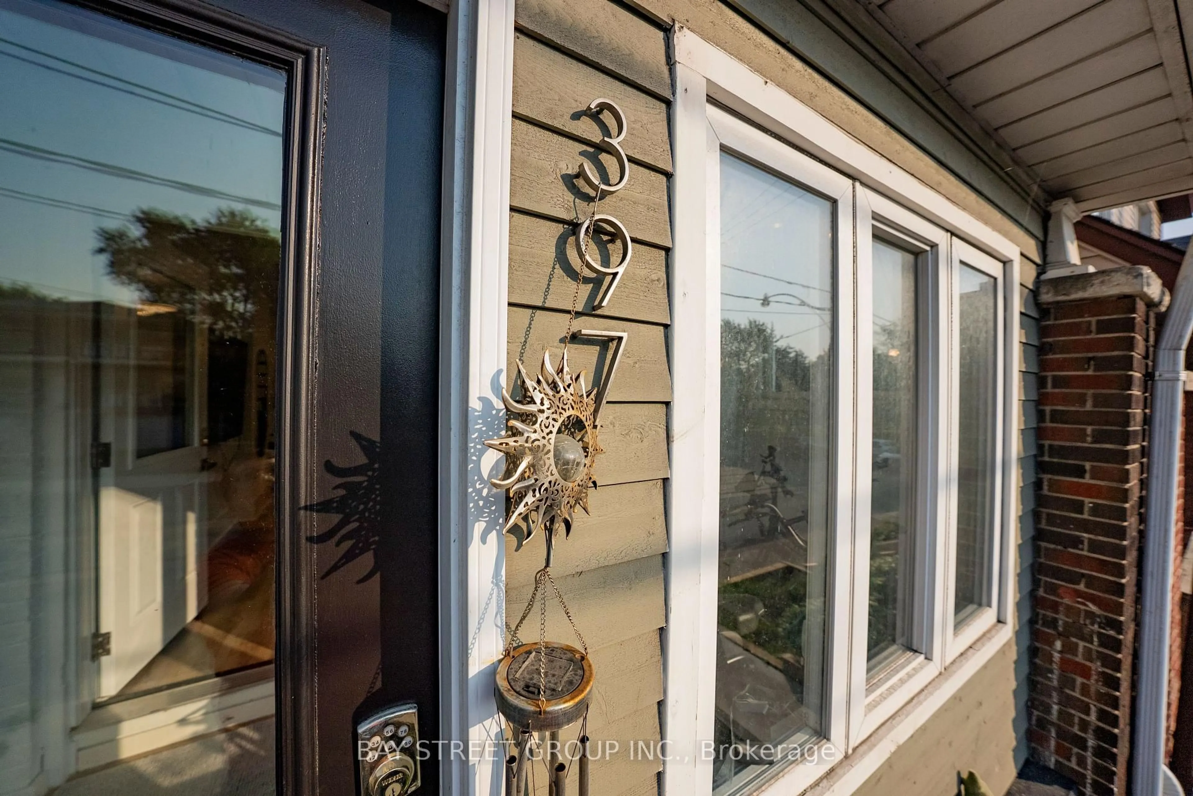 Home with vinyl exterior material, street for 397 Kingston Rd, Toronto Ontario M4L 1V1