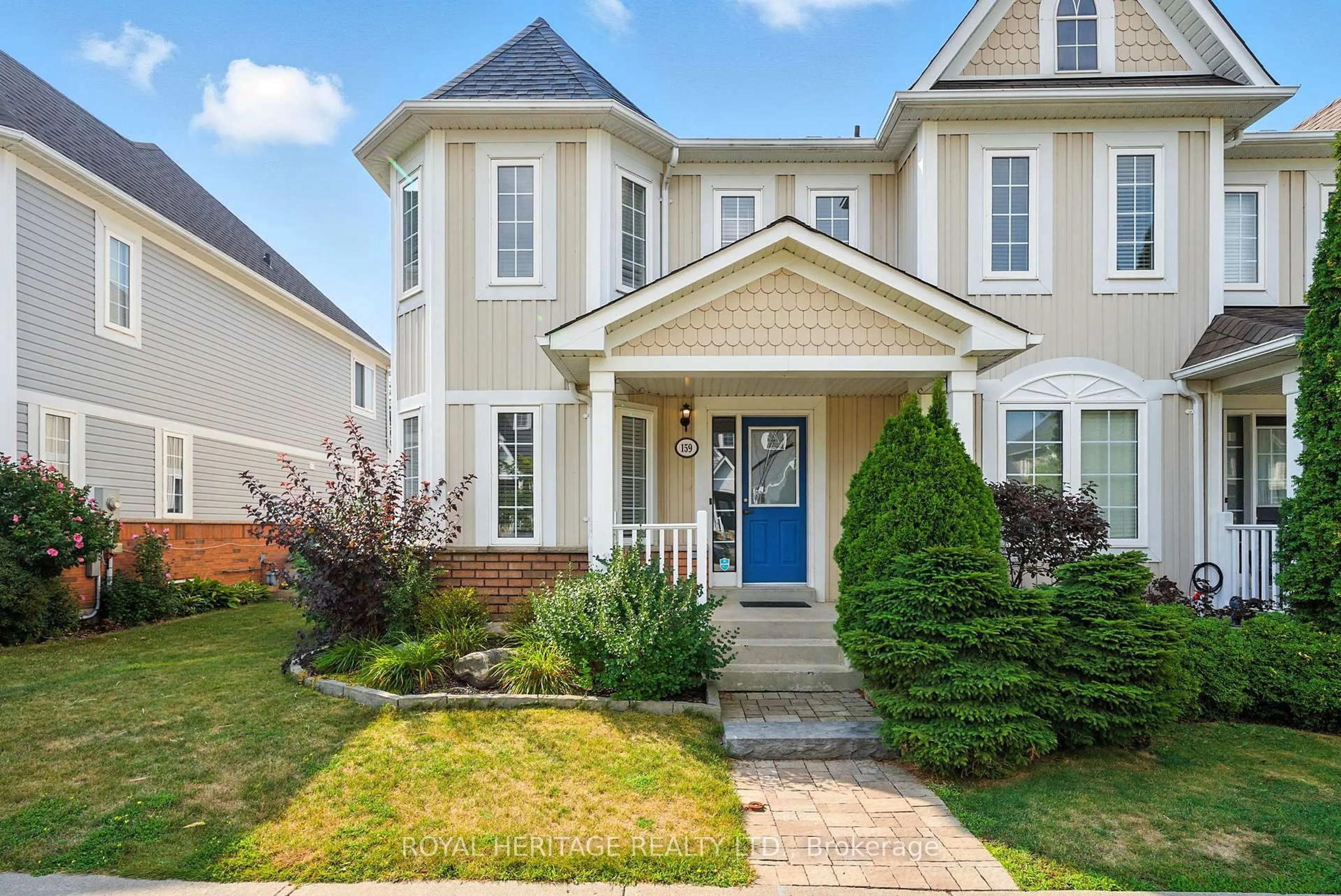 Home with vinyl exterior material, street for 159 Carnwith Dr, Whitby Ontario L1M 2J5