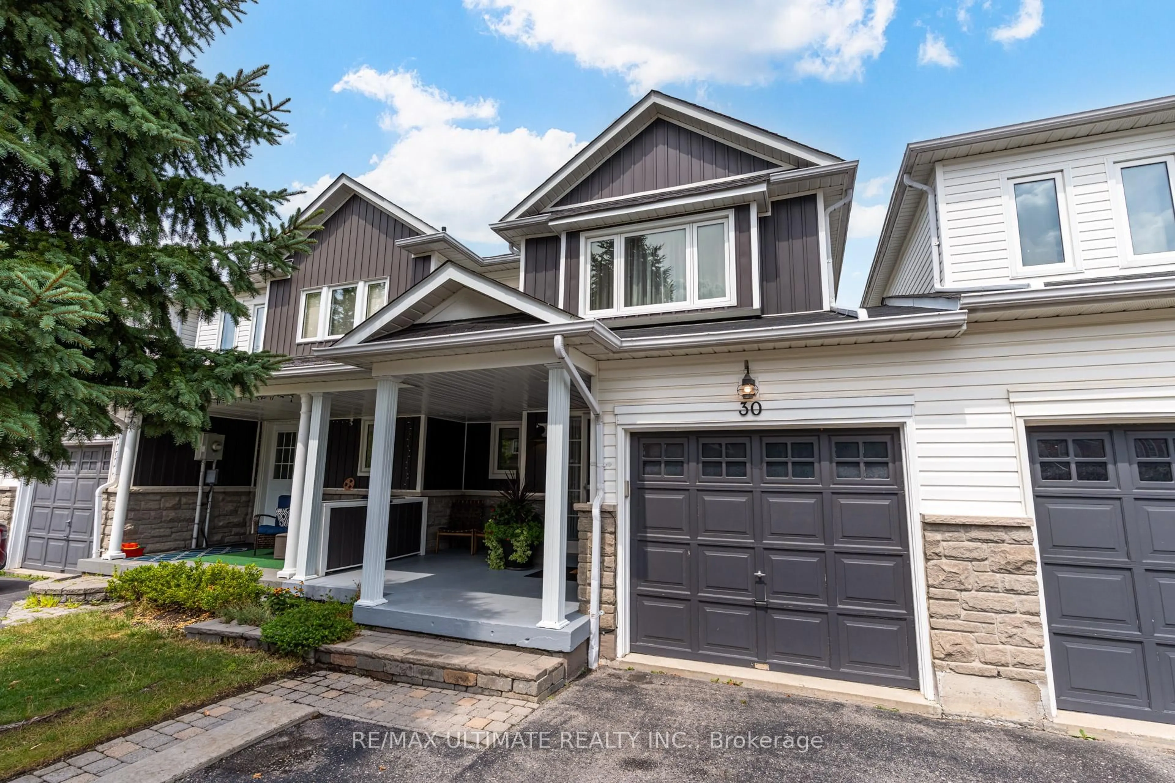 Home with vinyl exterior material, street for 30 Primeau Ave, Whitby Ontario L1M 2B7