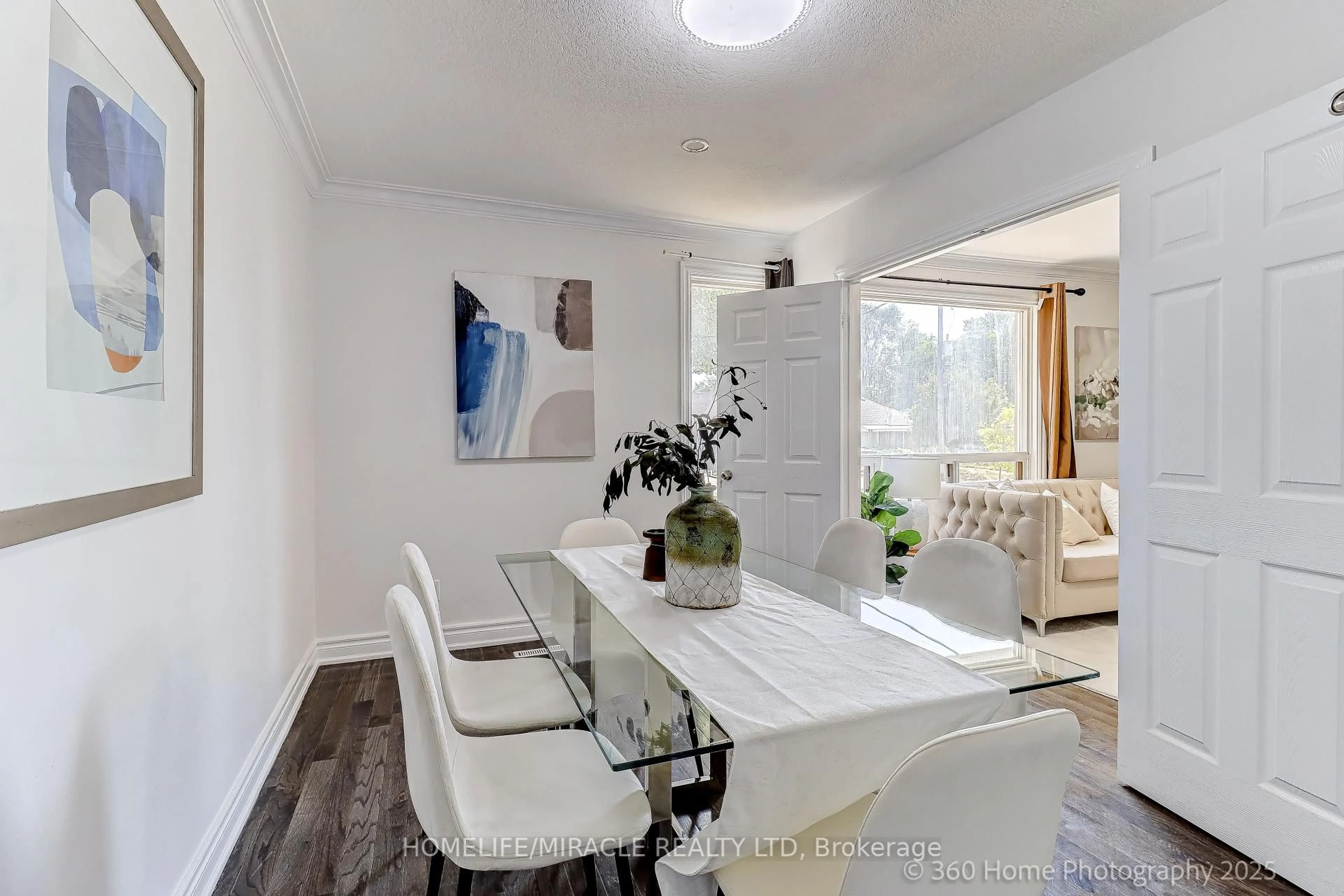 Dining room, wood/laminate floor for 34 Merrian Rd, Toronto Ontario M1K 3M7