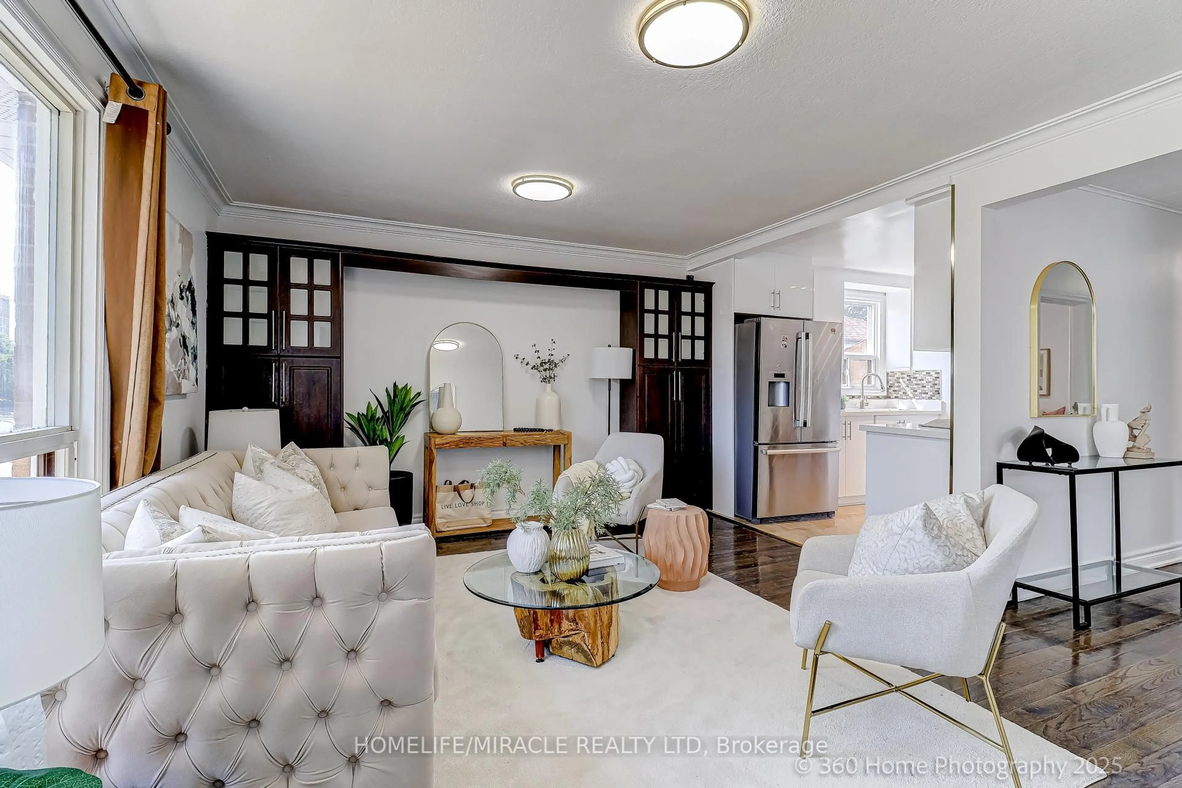 Living room with furniture, unknown for 34 Merrian Rd, Toronto Ontario M1K 3M7