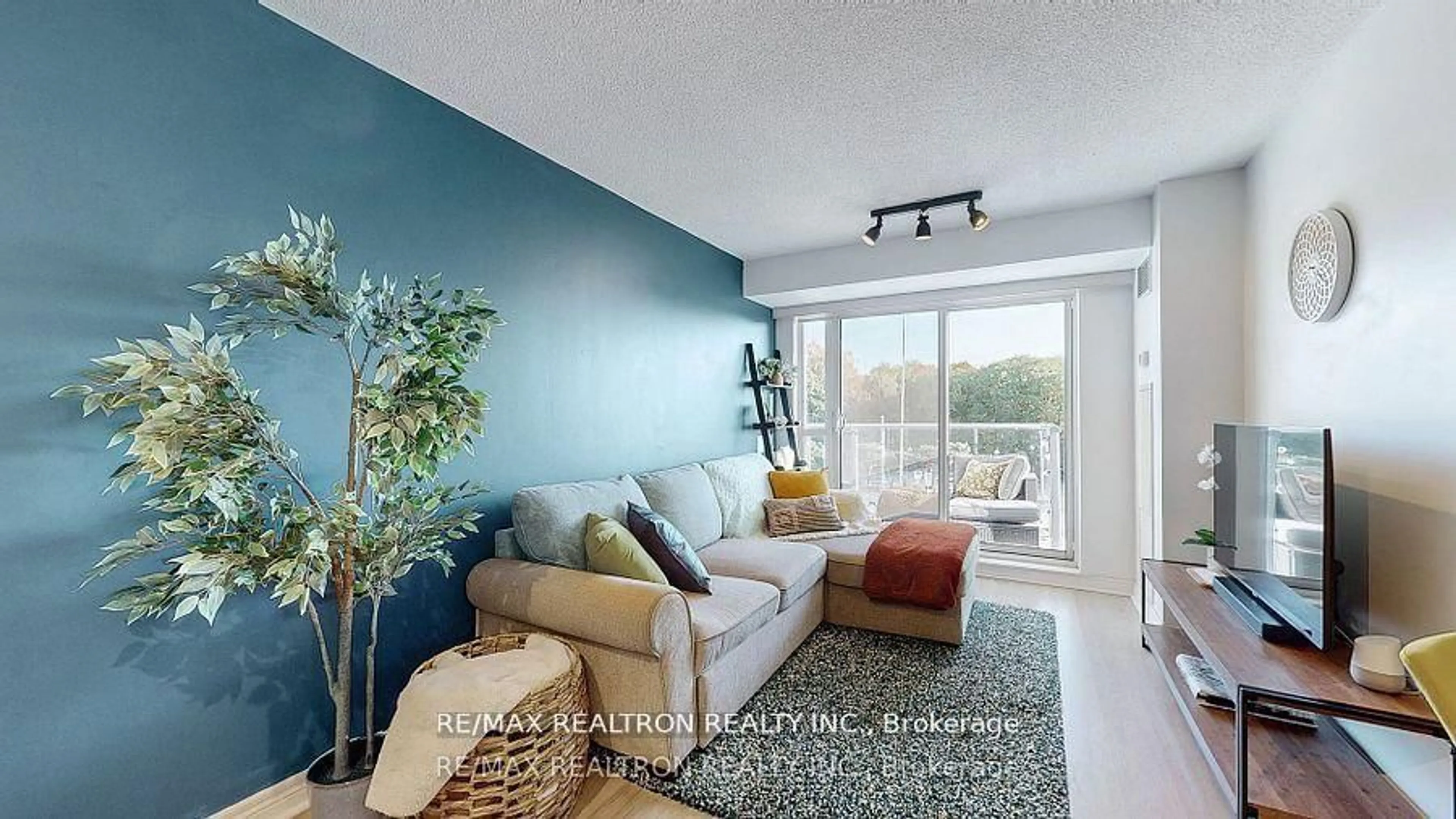 Living room with furniture, unknown for 60 Town Centre Crt #309, Toronto Ontario M1P 0B1