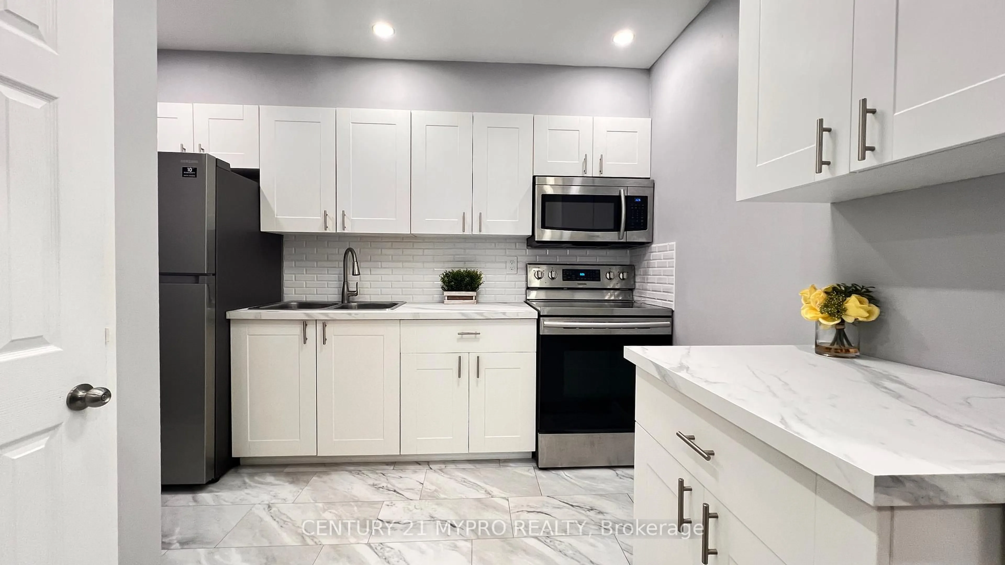Standard kitchen, ceramic/tile floor for 100 Mornelle Crt #1034, Toronto Ontario M1E 4X2