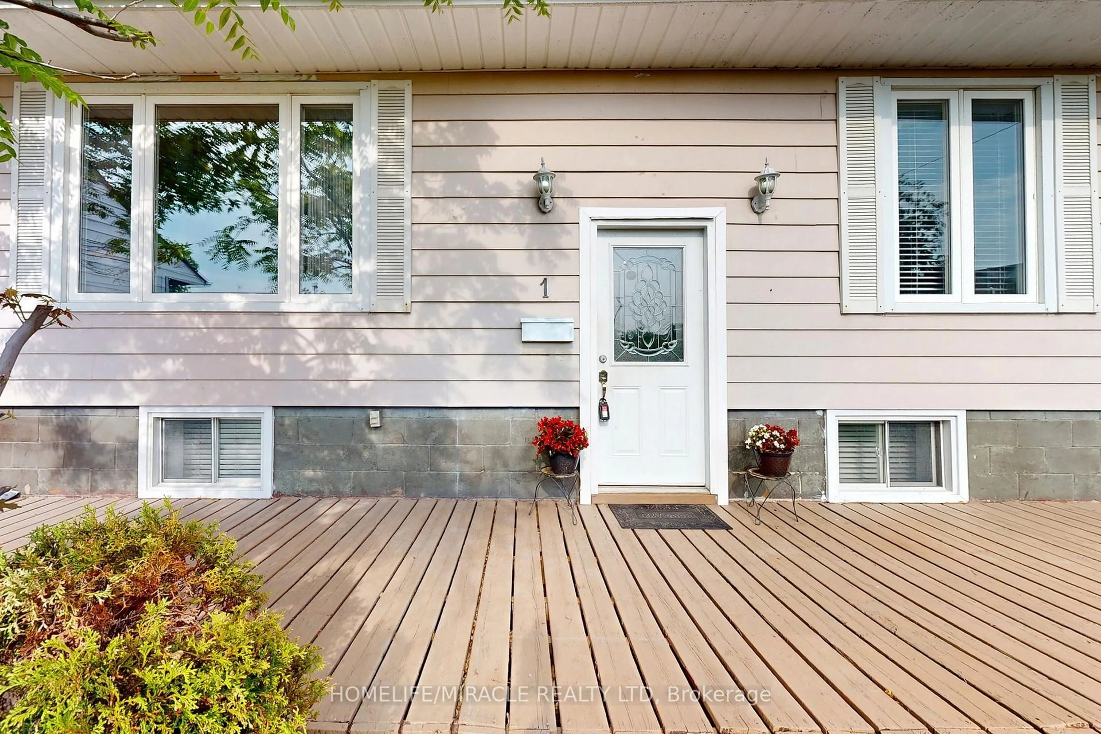 Home with vinyl exterior material, street for 1 Tudor Ave, Ajax Ontario L1S 1Z8