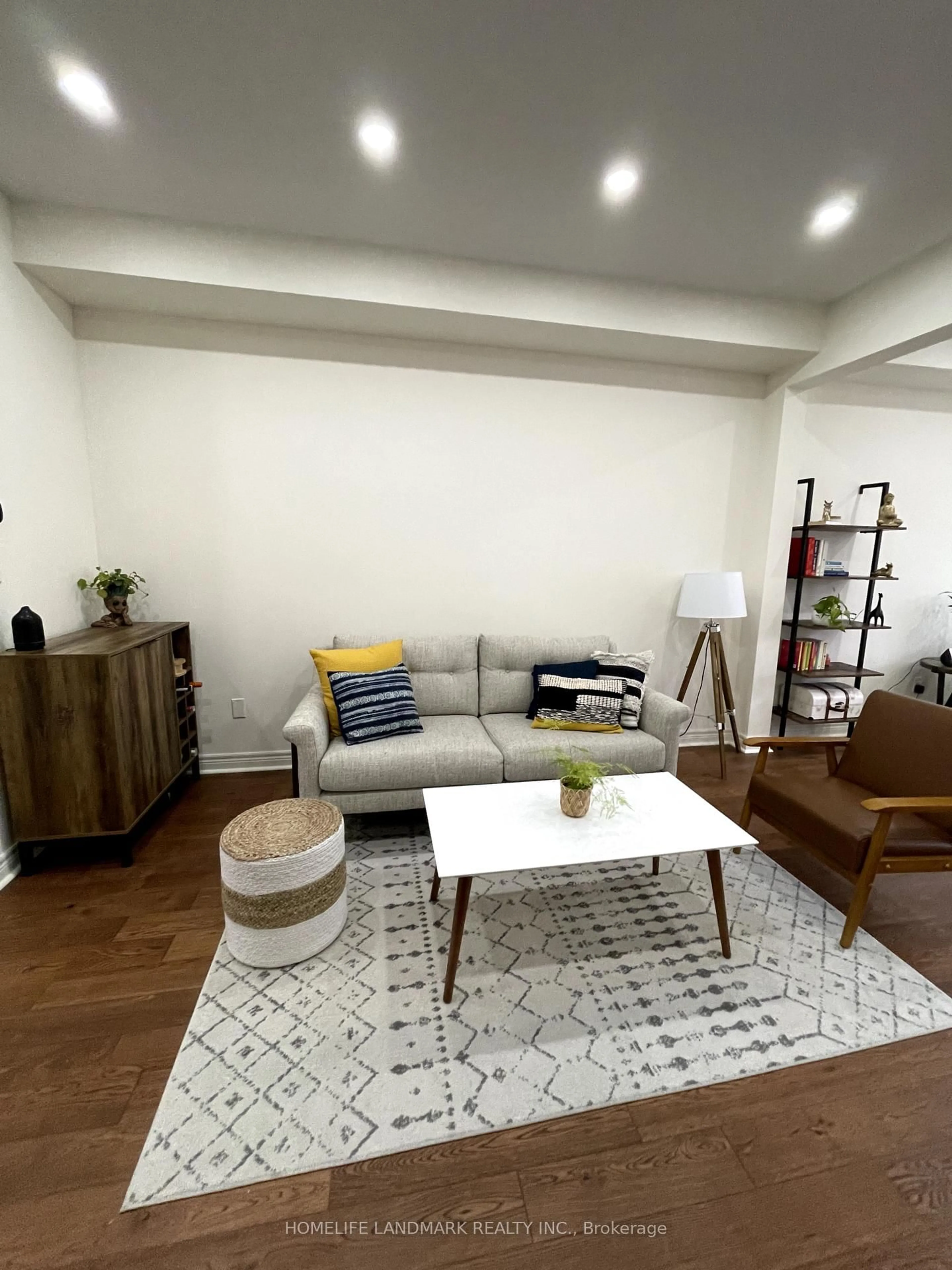 Living room with furniture, wood/laminate floor for 628 Krawchuk Cres, Oshawa Ontario L1K 1A7