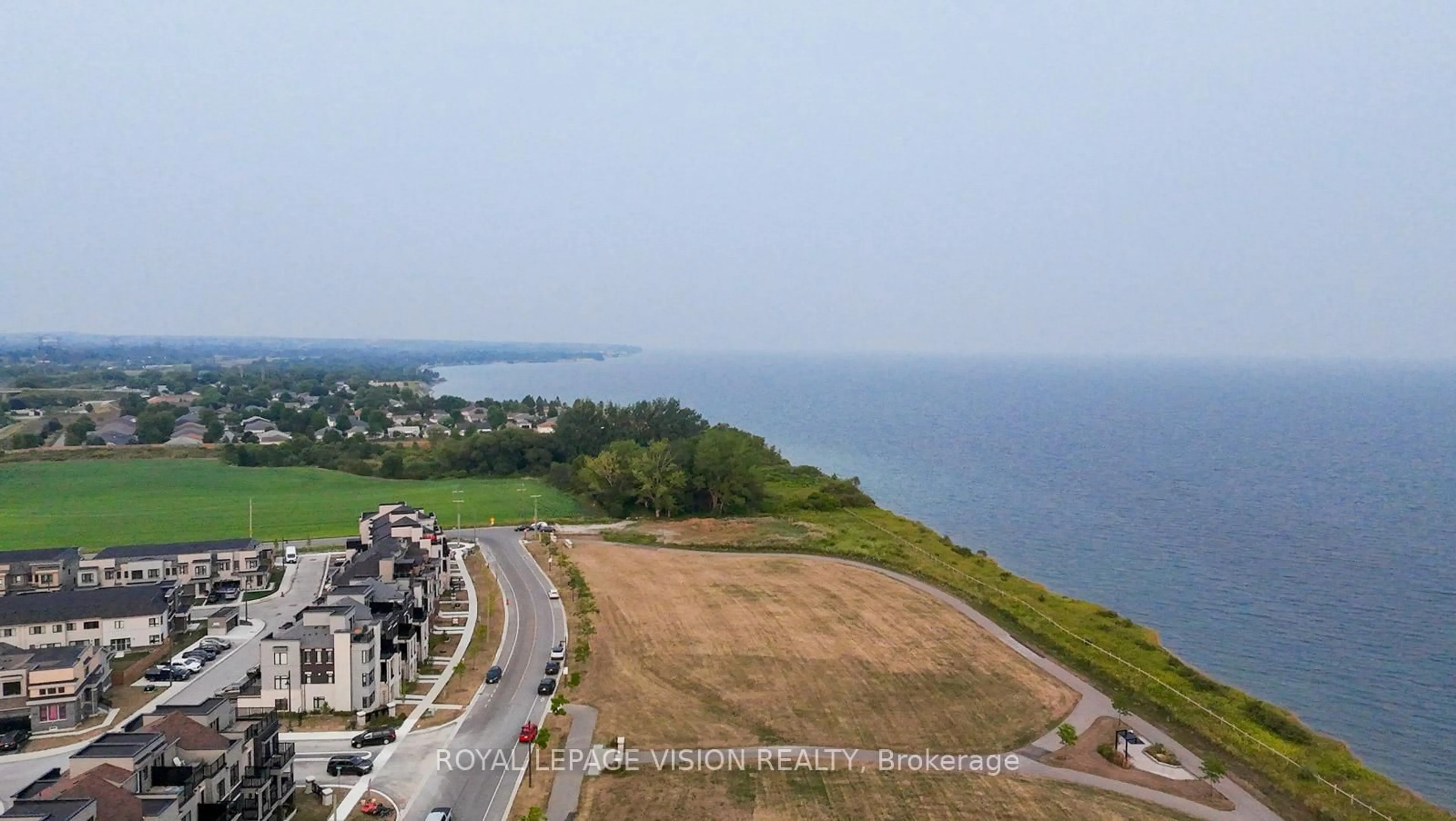 A pic from outside/outdoor area/front of a property/back of a property/a pic from drone, water/lake/river/ocean view for 74 Caspian Square Dr, Clarington Ontario L1C 7G4