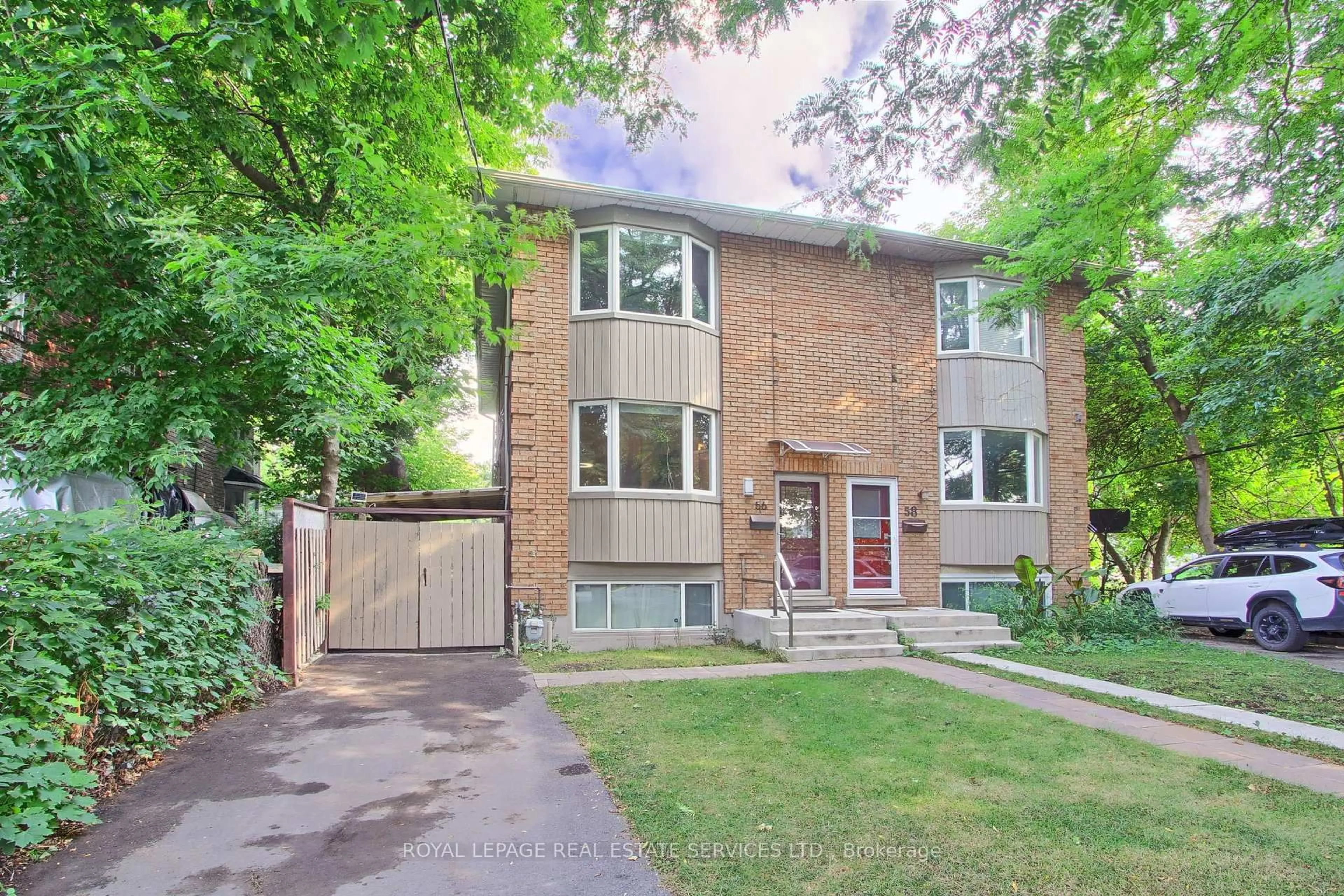 Home with brick exterior material, street for 56 Ashland Ave, Toronto Ontario M4L 1K1