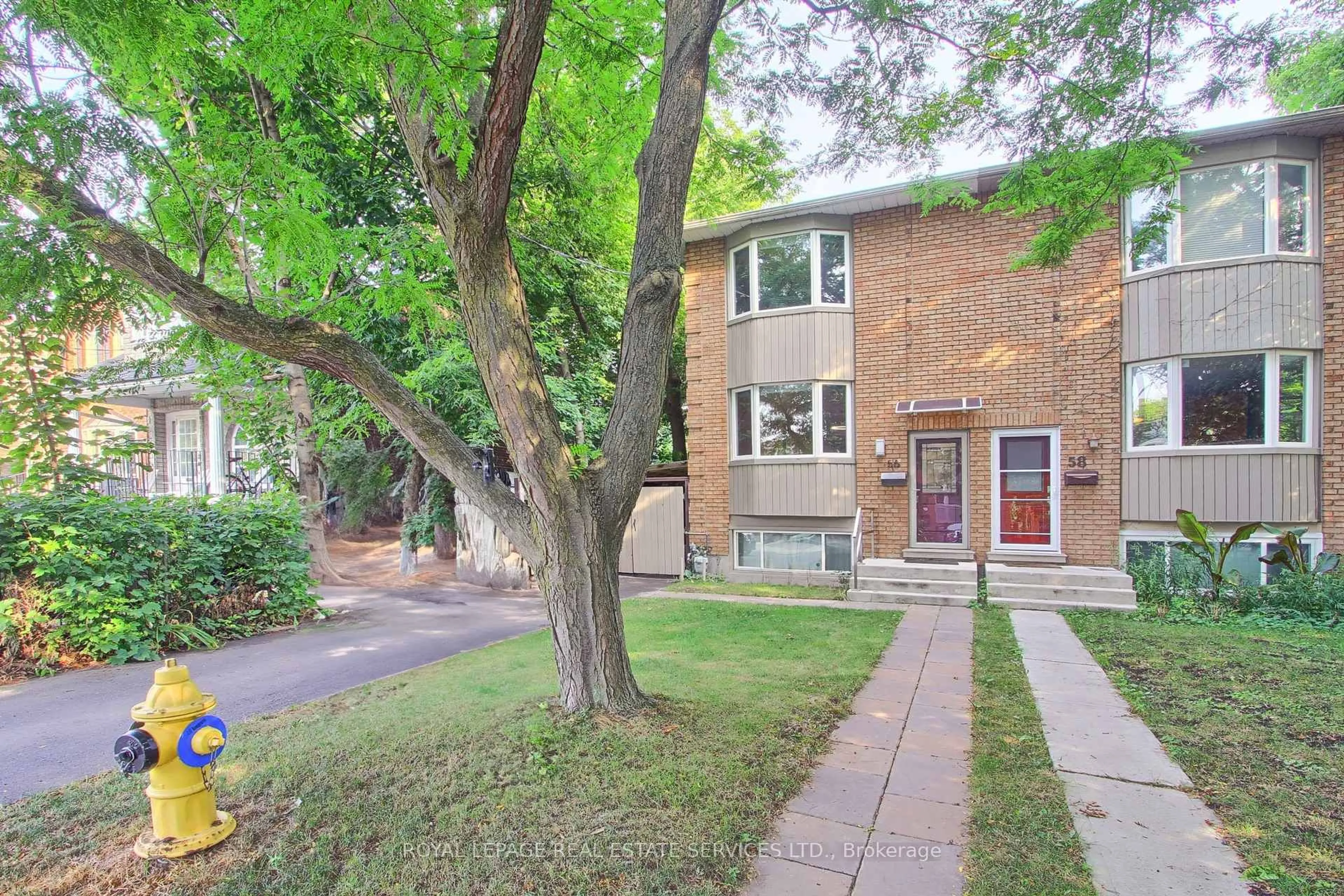 Home with brick exterior material, street for 56 Ashland Ave, Toronto Ontario M4L 1K1