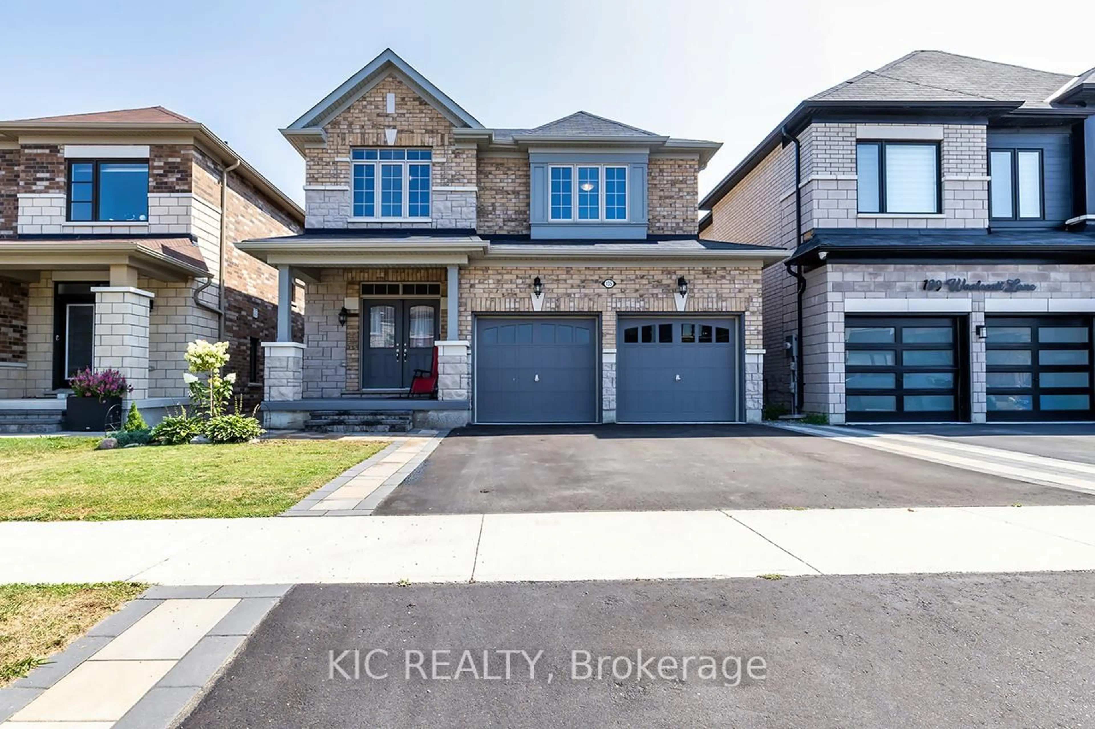 Home with brick exterior material, street for 135 Woolacott Lane, Clarington Ontario L1C 0J4