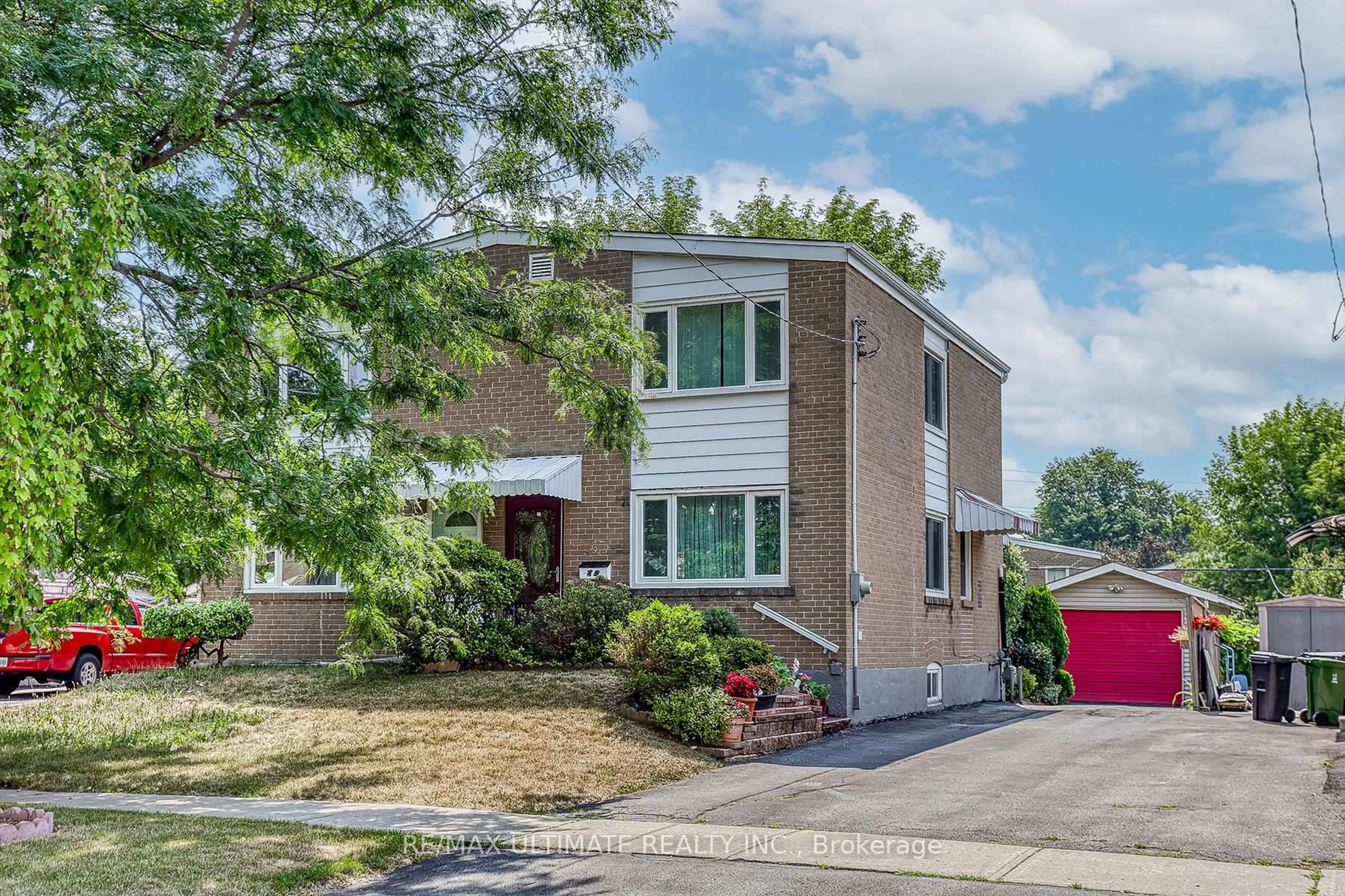 Home with brick exterior material, street for 49 Ashwick Dr, Toronto Ontario M1K 2L1