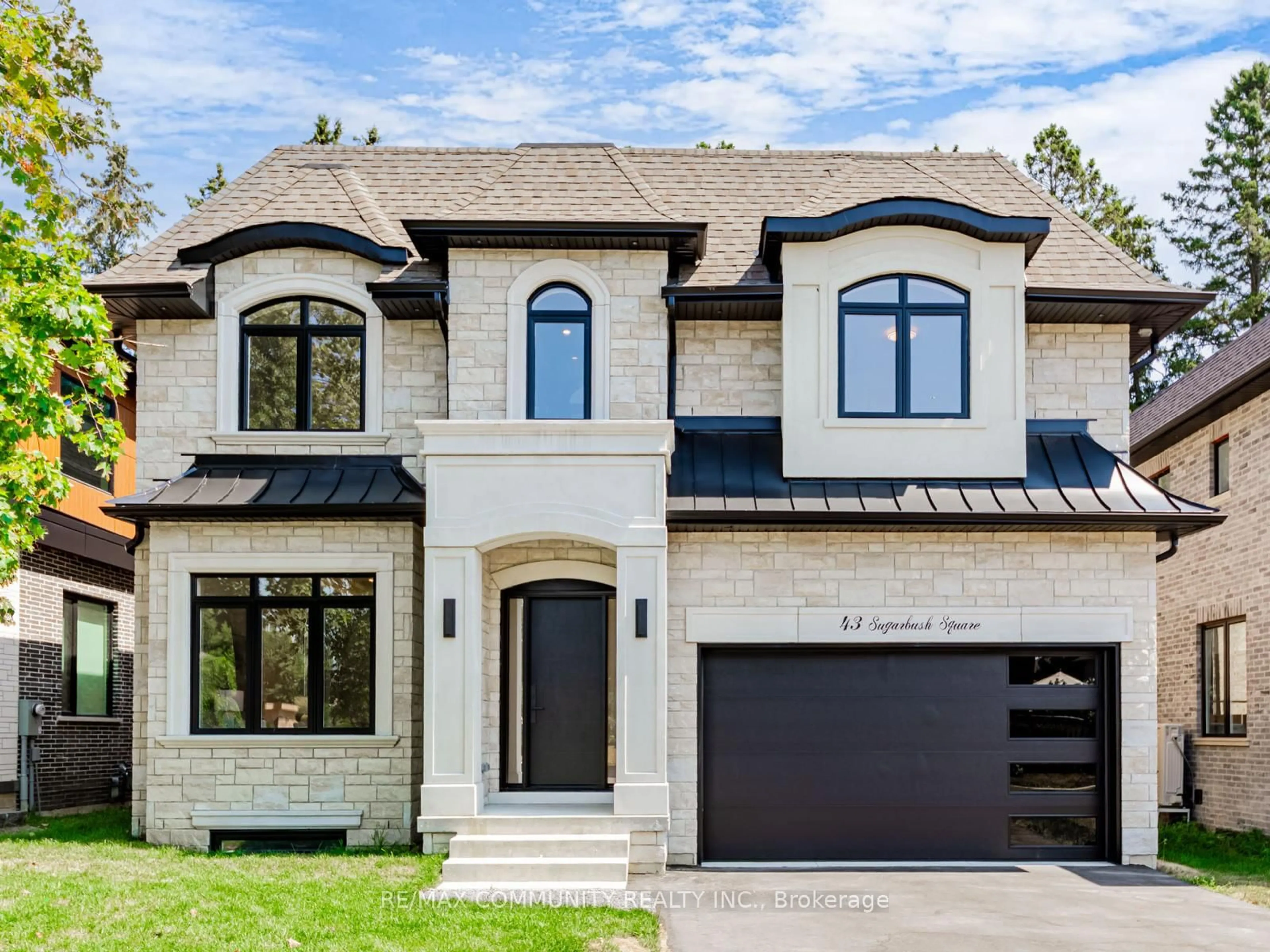 Home with brick exterior material, street for 43 Sugarbush Sq, Toronto Ontario M1C 3M6