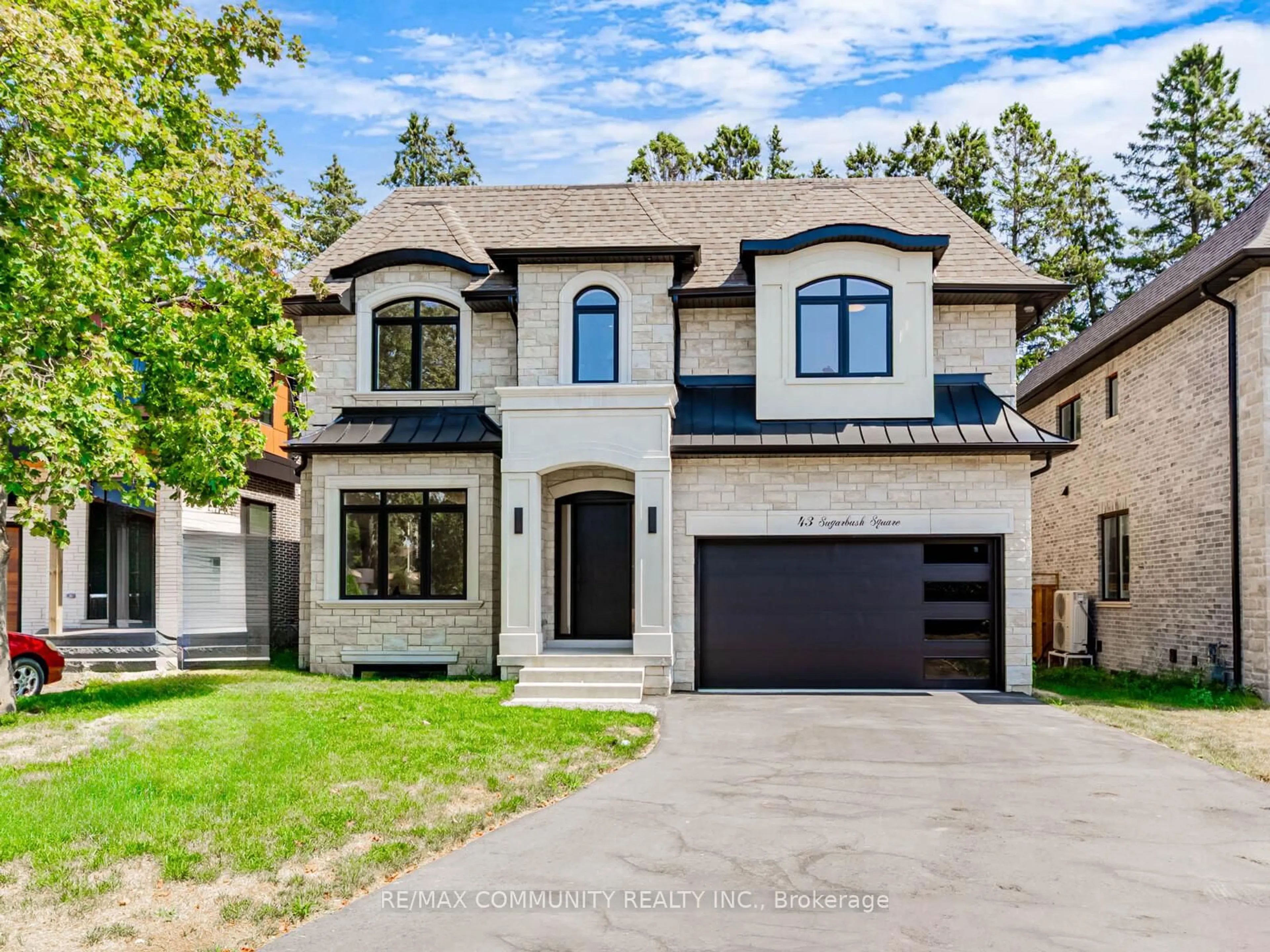 Home with brick exterior material, street for 43 Sugarbush Sq, Toronto Ontario M1C 3M6