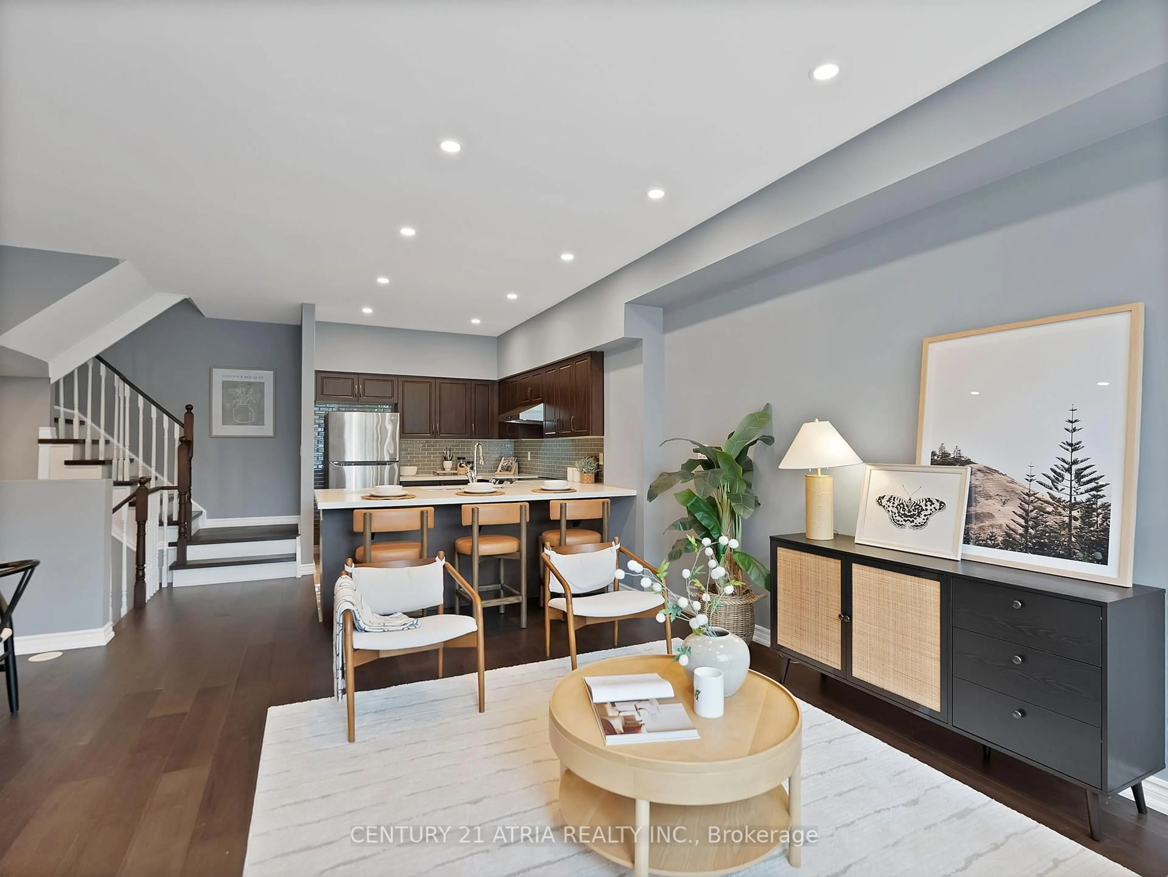 Open concept kitchen, wood/laminate floor for 1251 Bridletowne Circ #3, Toronto Ontario M1W 0A5