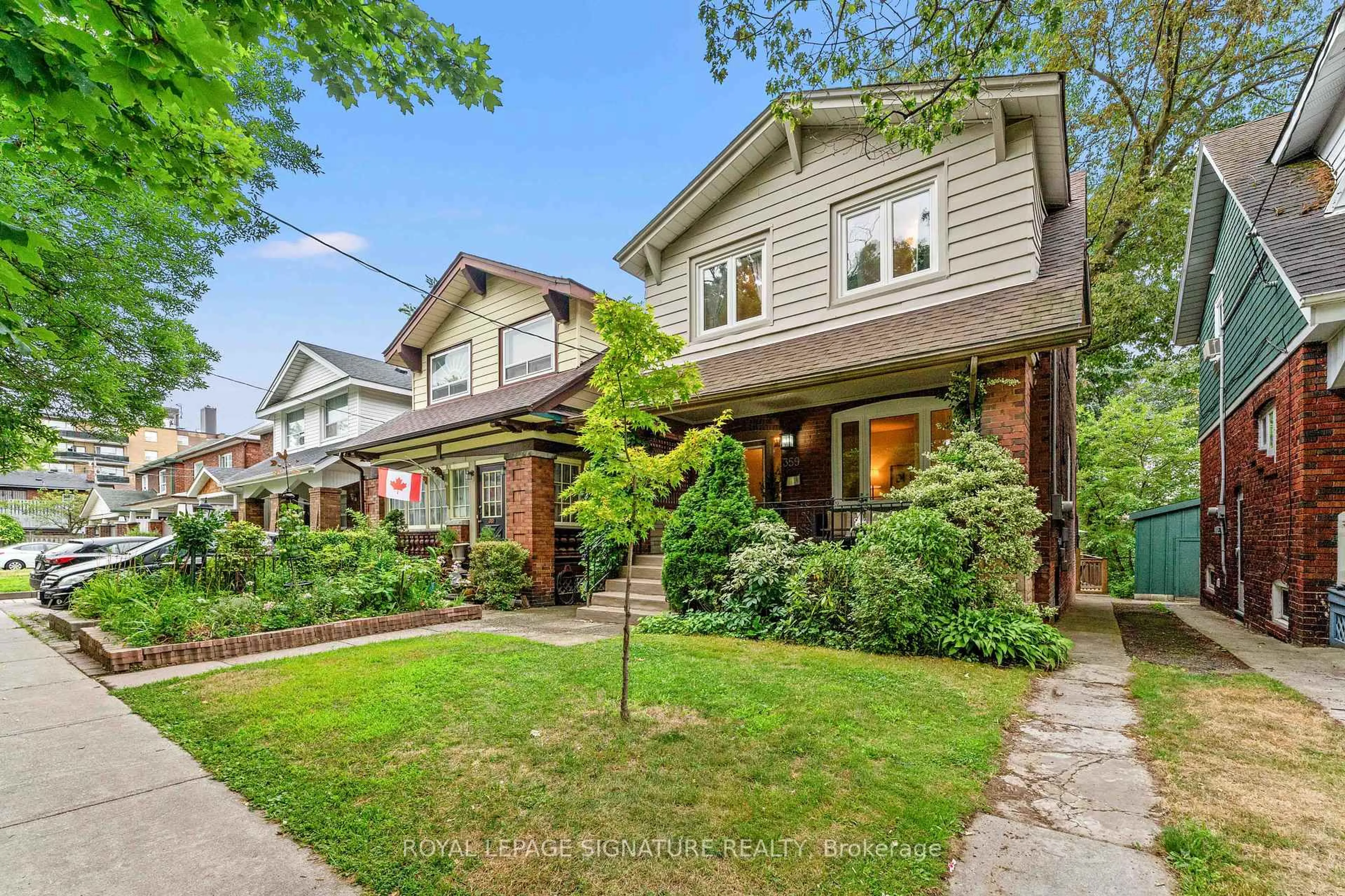 Home with brick exterior material, street for 359 Wolverleigh Blvd, Toronto Ontario M4C 1S7
