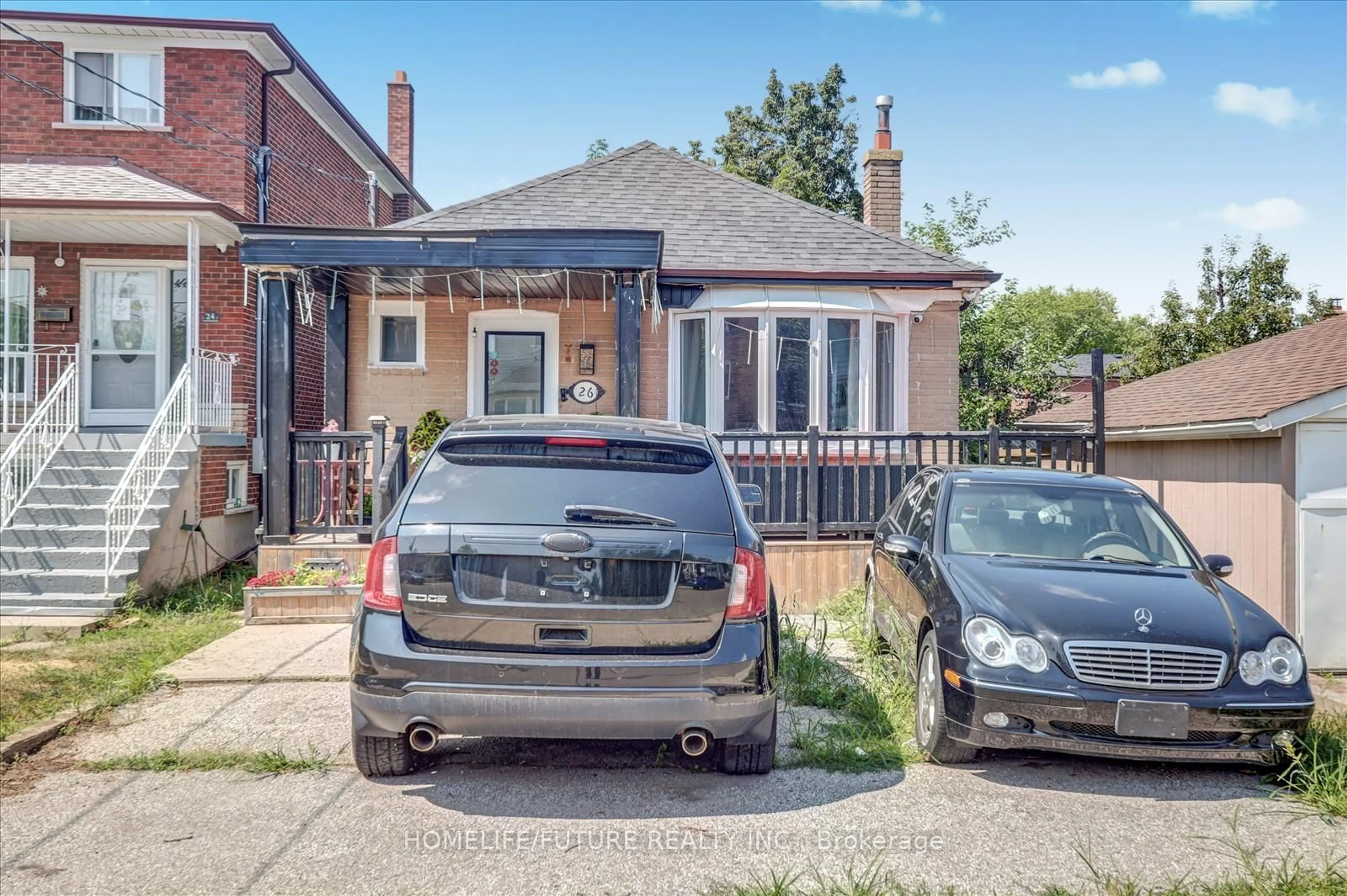 Home with brick exterior material, street for 26 North Bonnington Ave, Toronto Ontario M1K 1X2