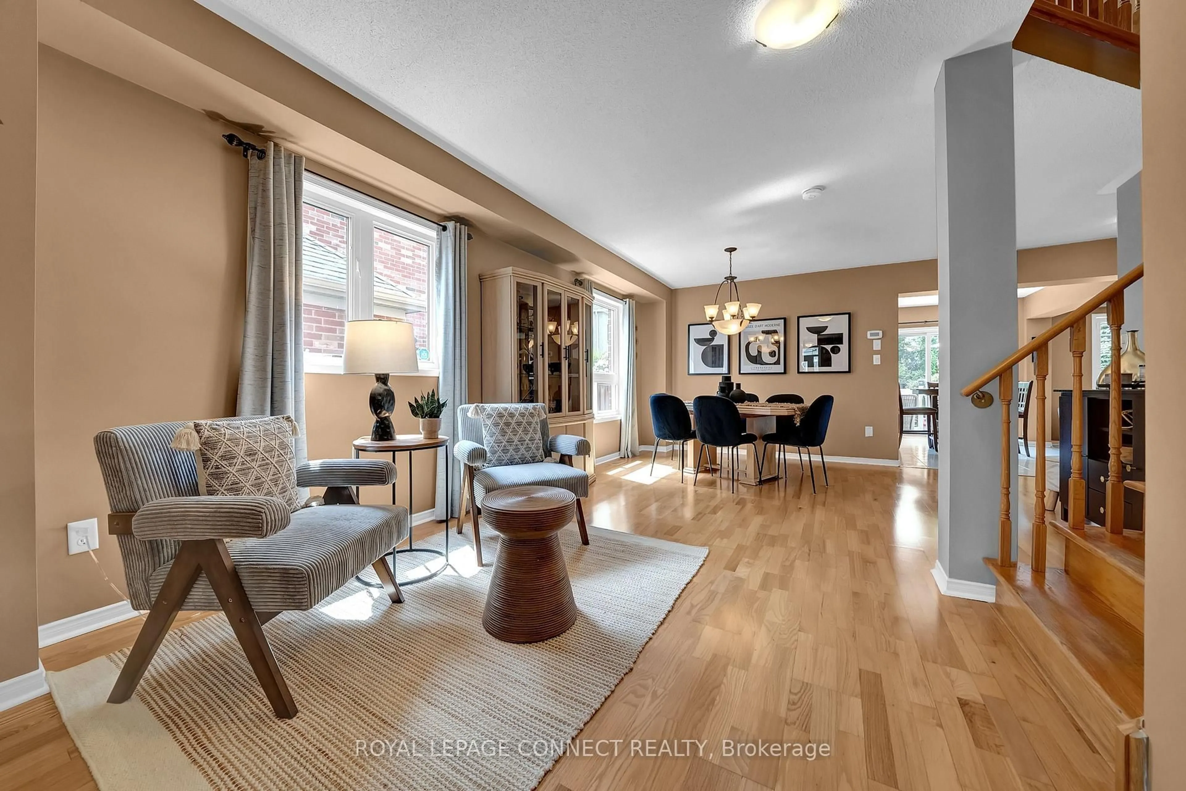 Living room with furniture, wood/laminate floor for 4 Middlecote Dr, Ajax Ontario L1T 0A9