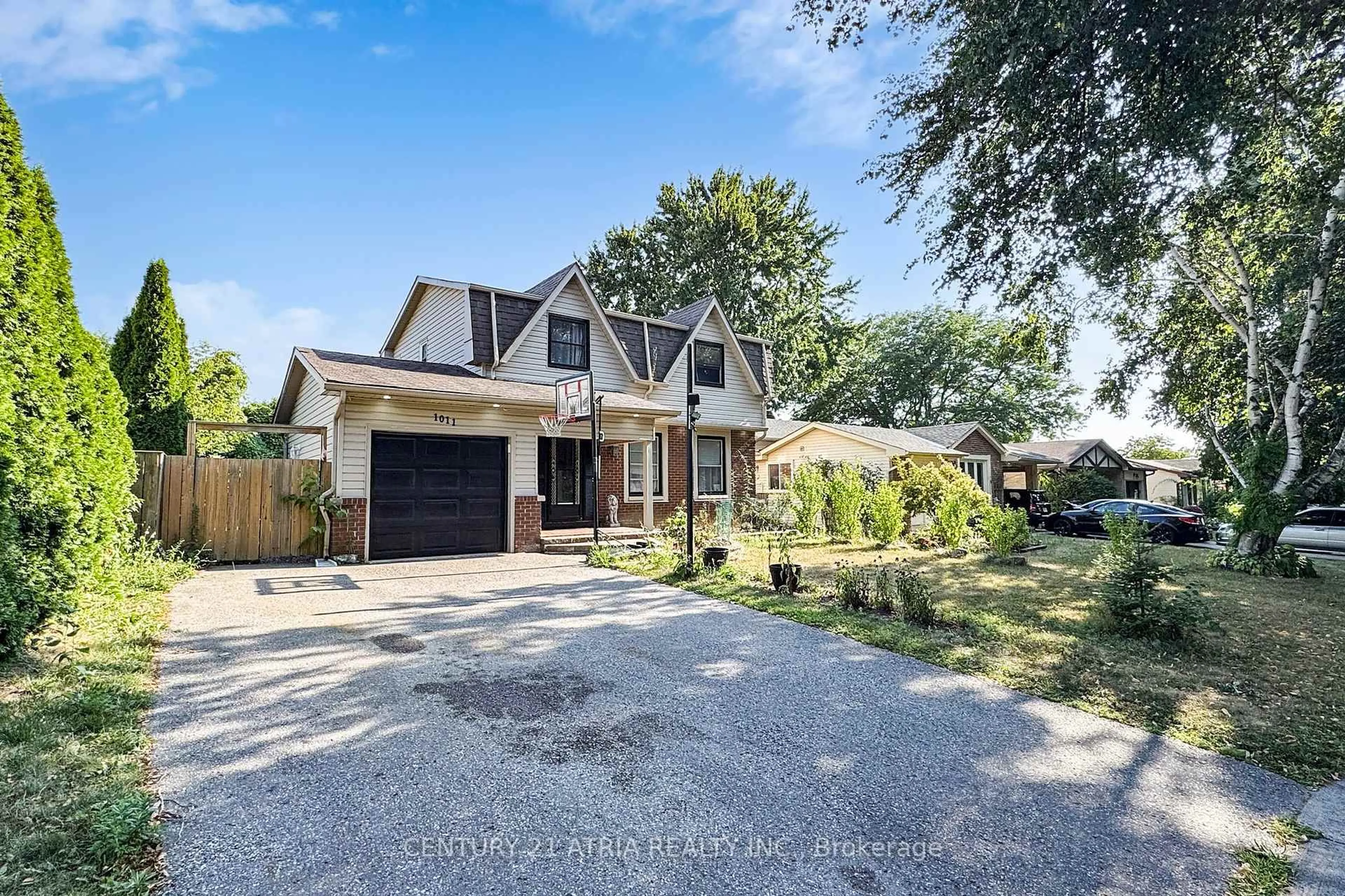 Home with brick exterior material, street for 1011 Basswood Ave, Oshawa Ontario L1H 2G8