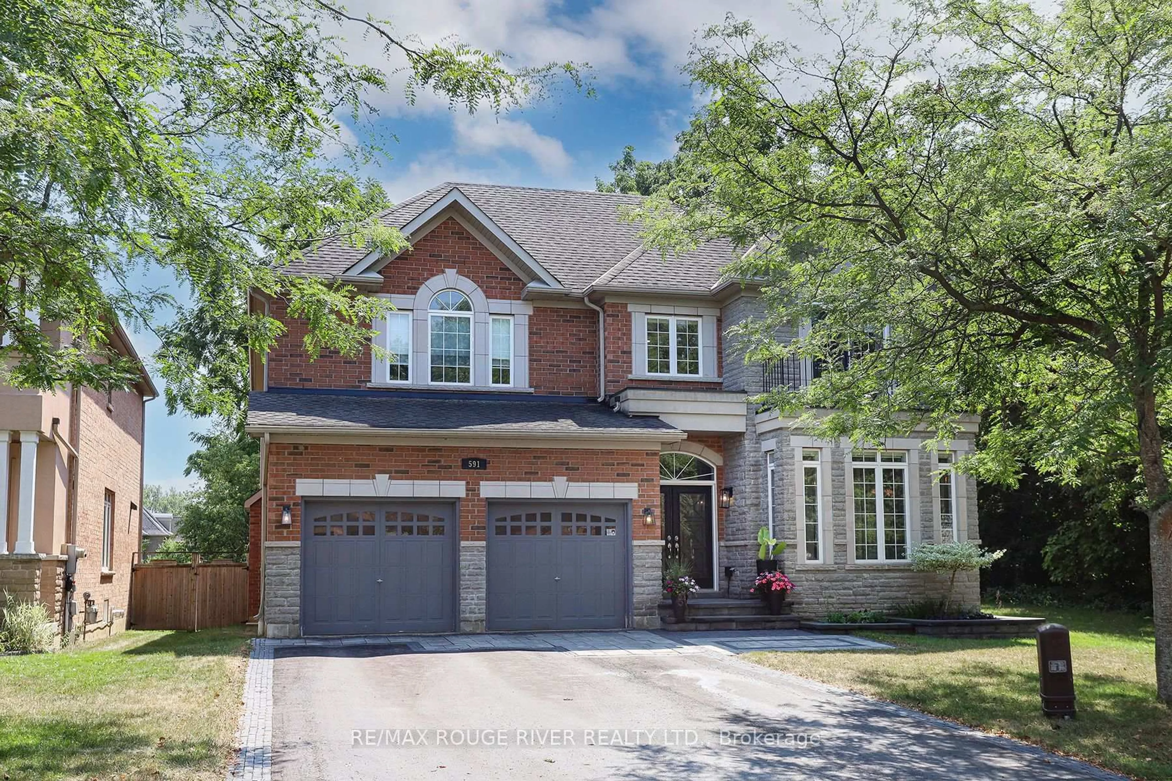 Home with brick exterior material, street for 591 Maitland Dr, Pickering Ontario L1W 3T6